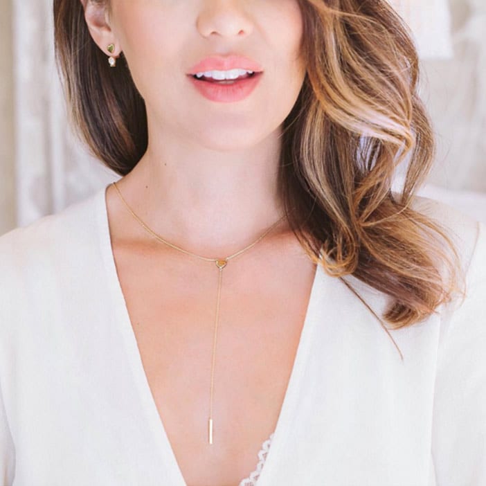 Jillian-Harris-wearing-JHxMA-heart-lariat-necklace