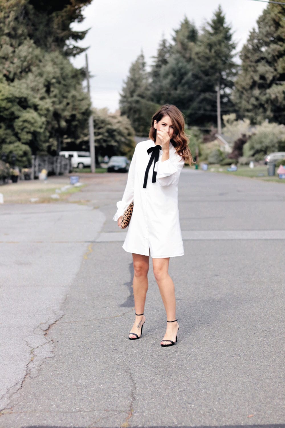 Jillian on set of Love It Or List it wearing white button up Nordstrom dress