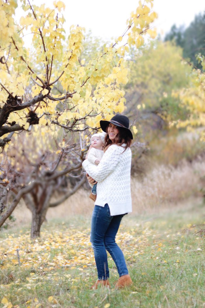 jill-holding-leo-in-the-orchard