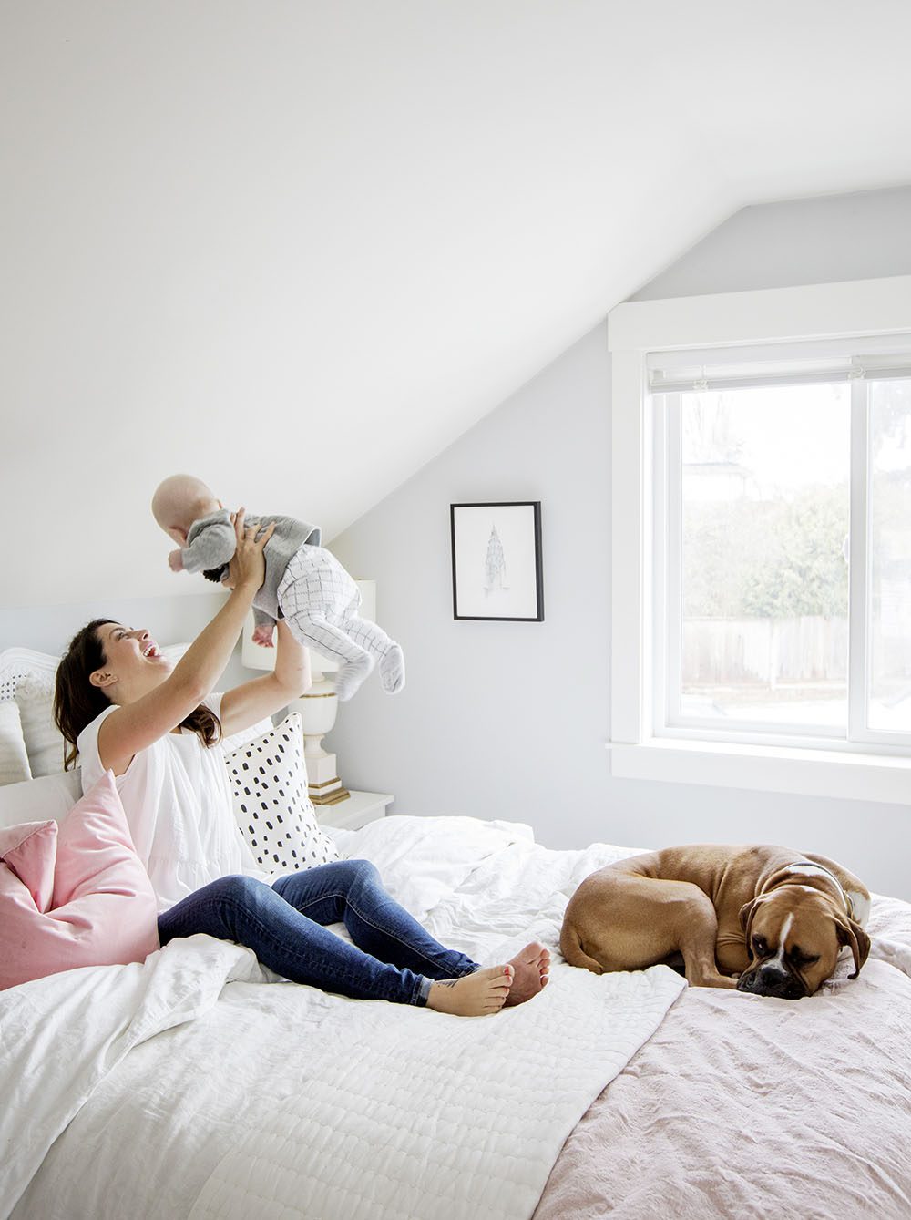 jillian-playing-with-leo-on-bed