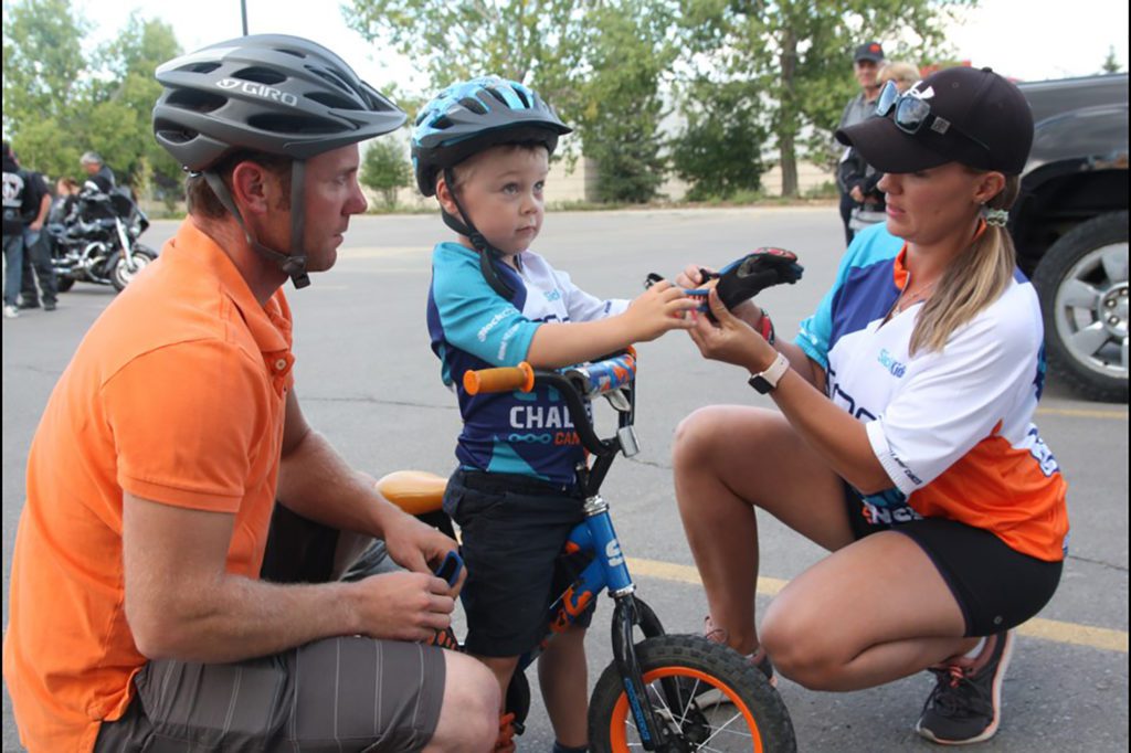 3-year-old Kolton Davis getting ready to ride to help conquer childhood cancer