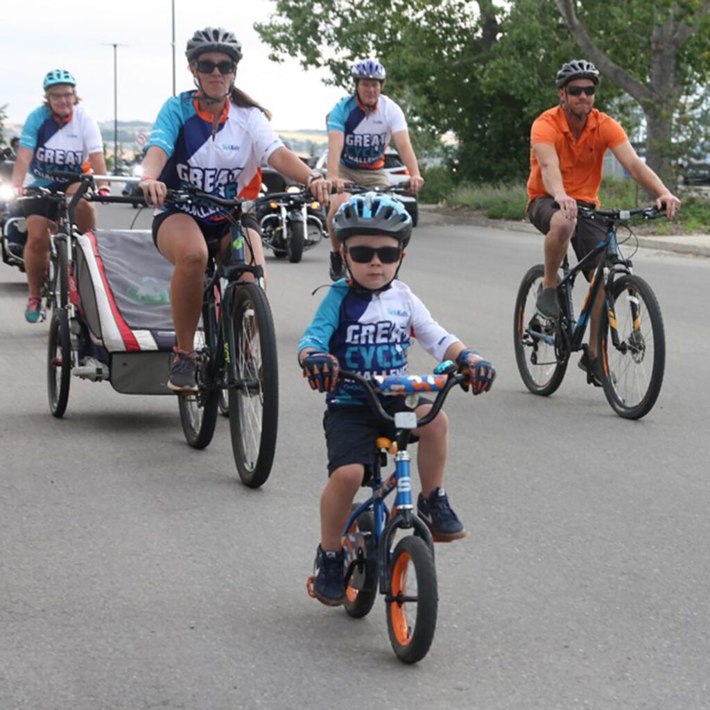 Kolton riding with his family