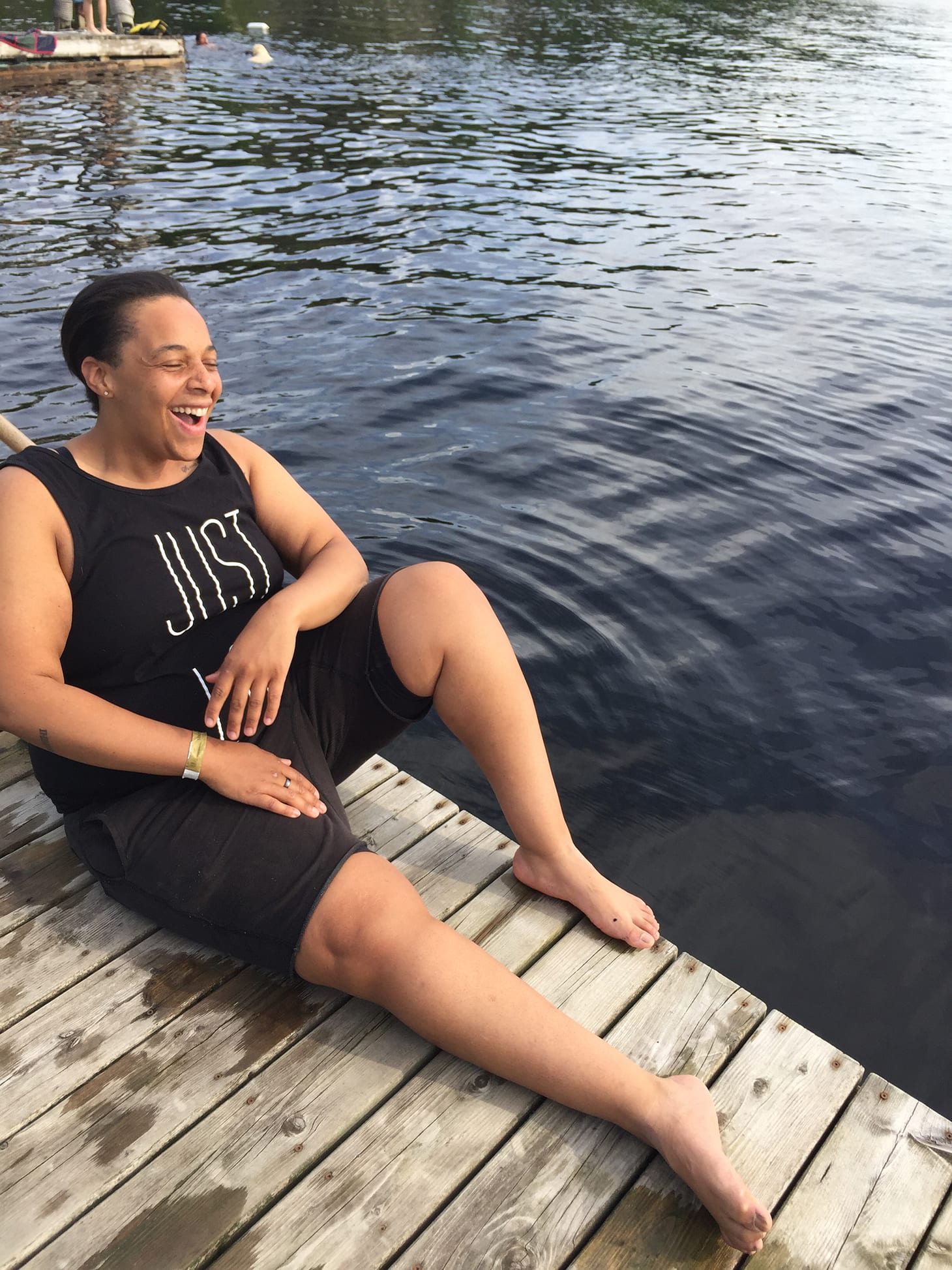 Health and wellness coach, Coach Carey on a dock.