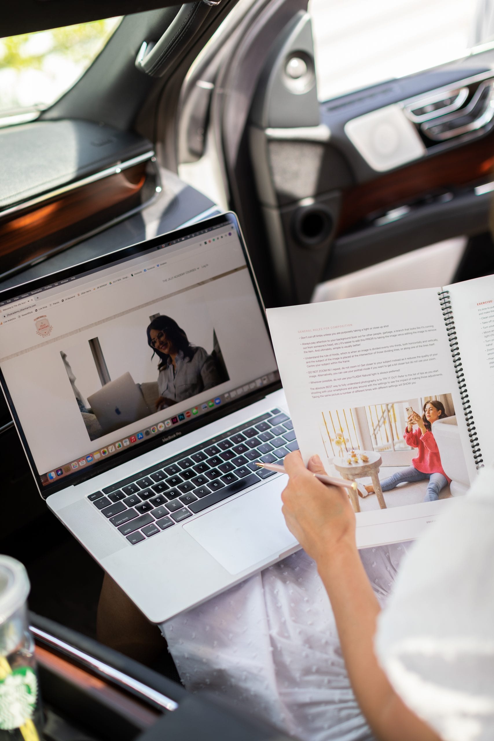 Jillian Harris working on The Jilly Academy Courses in her car on the go.