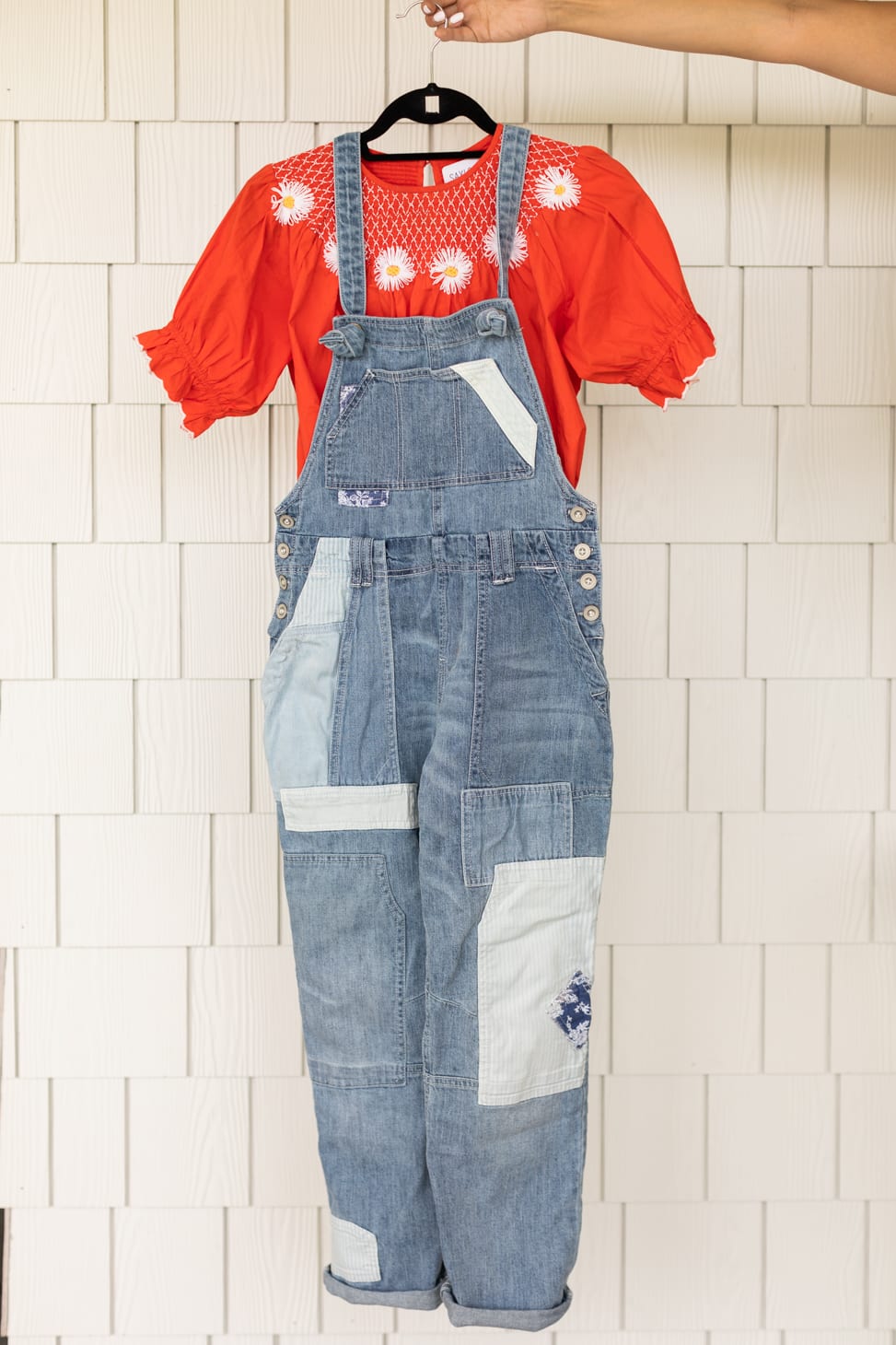 Jillian Harris' Favourite patchwork Overalls shown with a red short-sleeved prairie style shirt, one of her farm-inspired outfits.