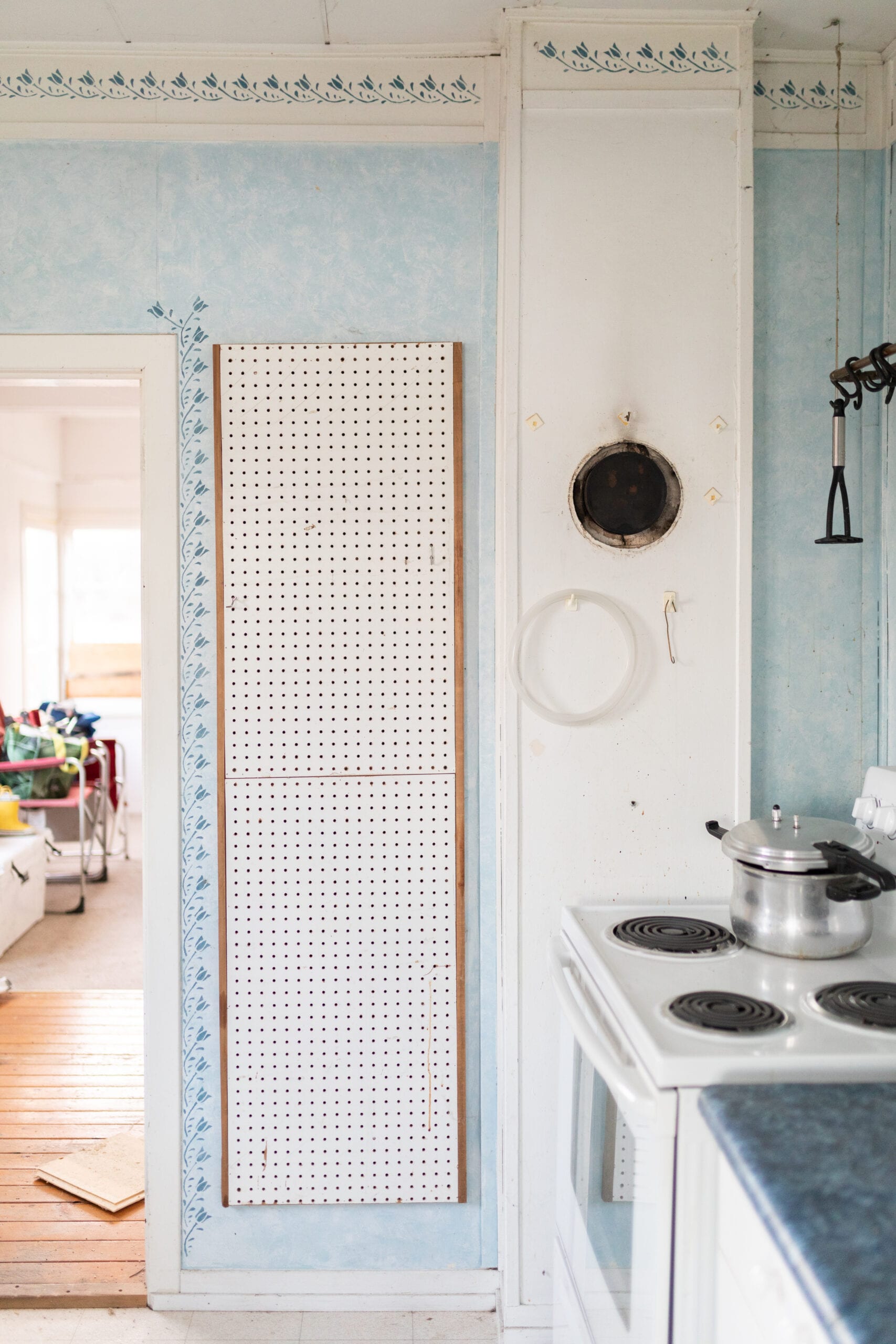 A kitchen wall in Jillian Harris and Justin Pasutto's Farmhouse before they started renovations.