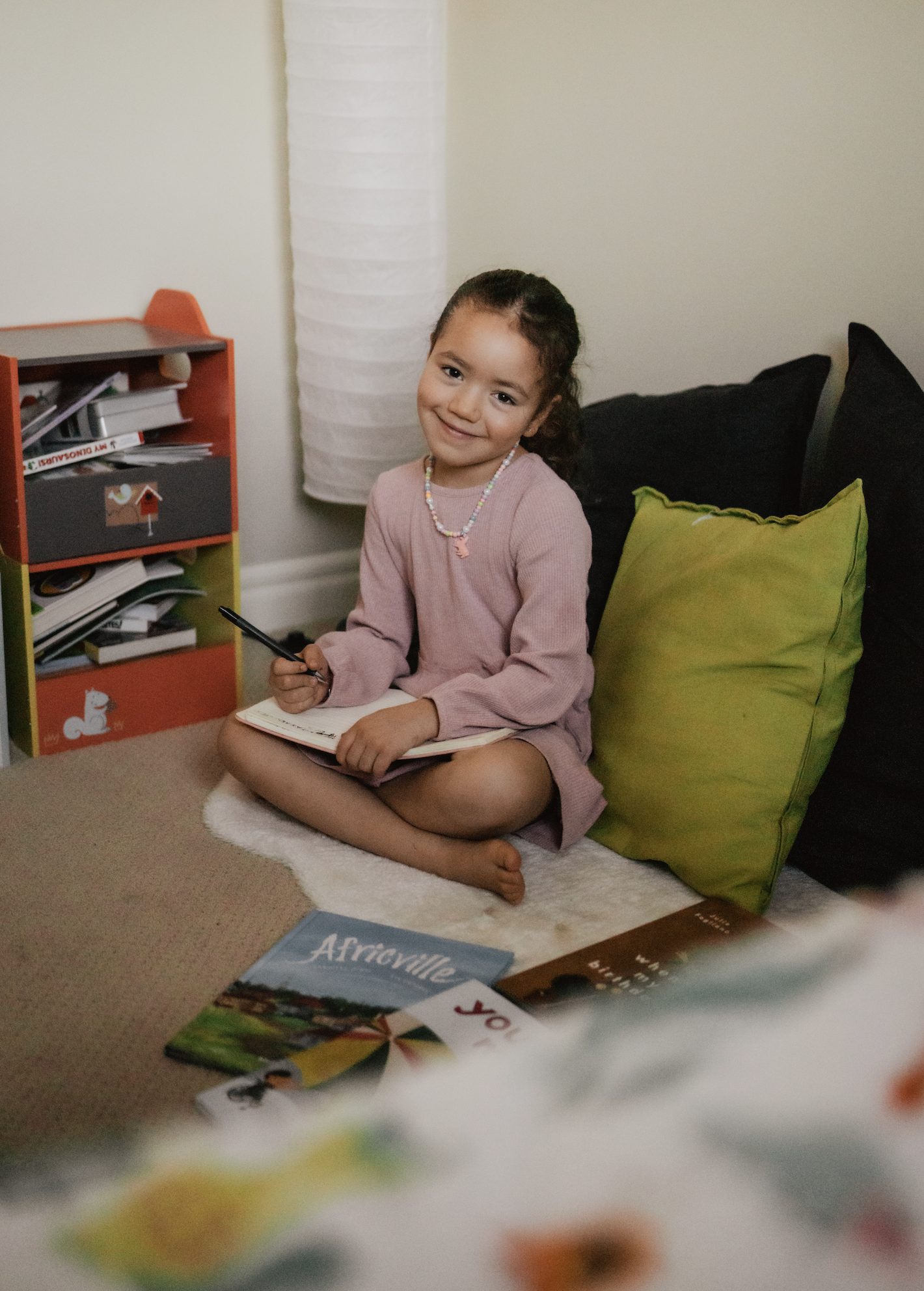 Journaling is a great interactive activity to guide conversations about privilege; make sure to do this for yourself, too! Photo by Rose and Range Photography, 2022.