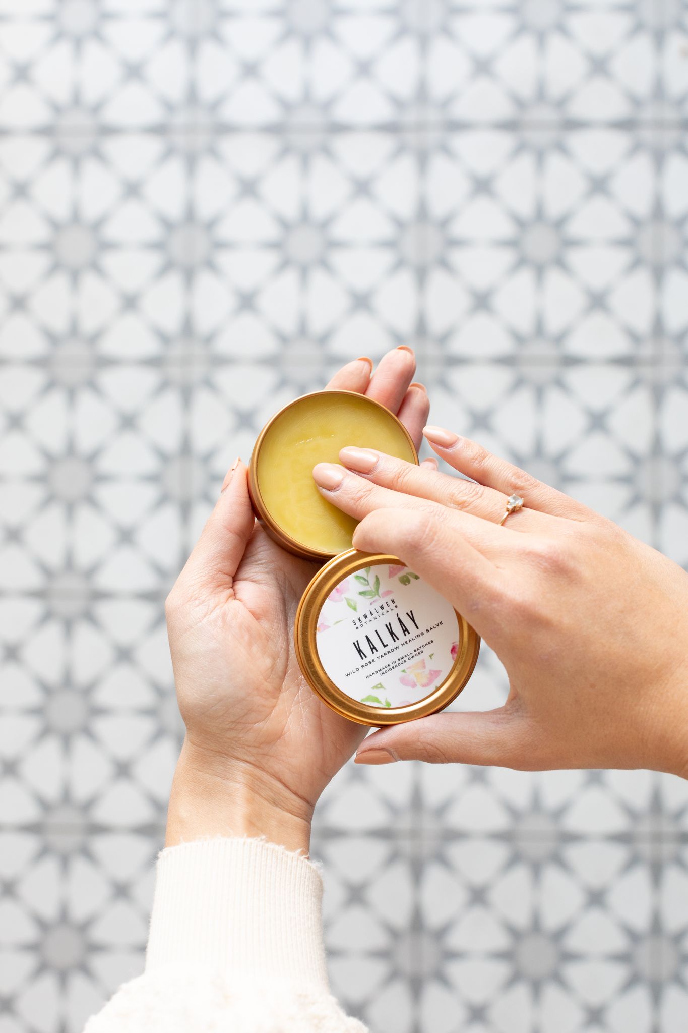 Jillian Harris using the Skwalwen Botanicals Kalkay Healing Salve included in the Spring 2022 Jilly Box