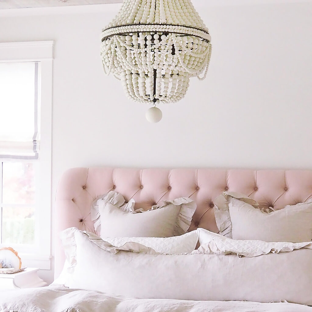 Photo of Jillian's bedroom with Jillian Bed and Shay Chandelier from The Cross Decor & Design. Women-Owned Brand to Support During Women's History Month