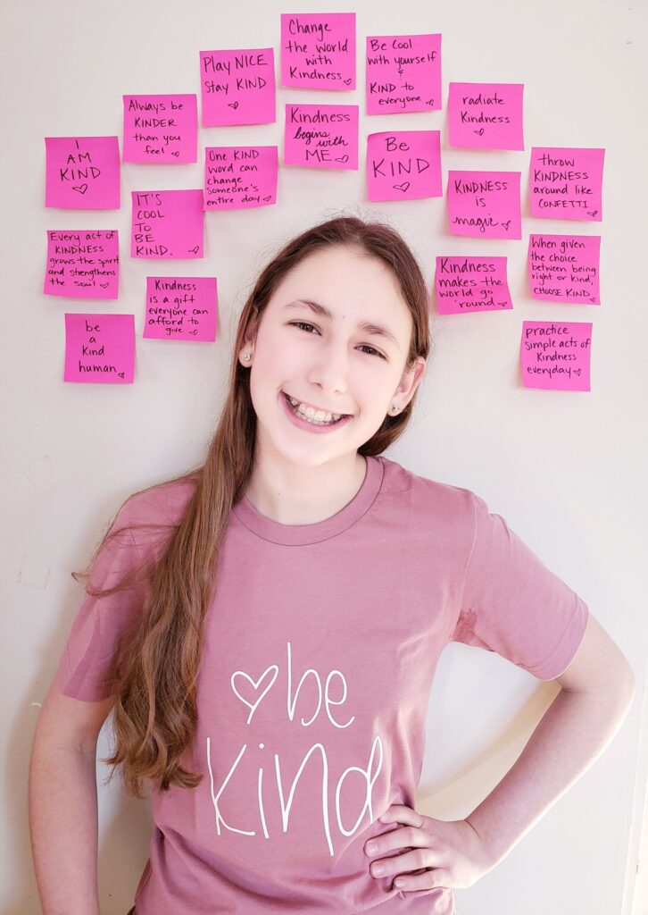 Catherine's Cause , Catherine with sticky notes around her that it's cool to be kind.