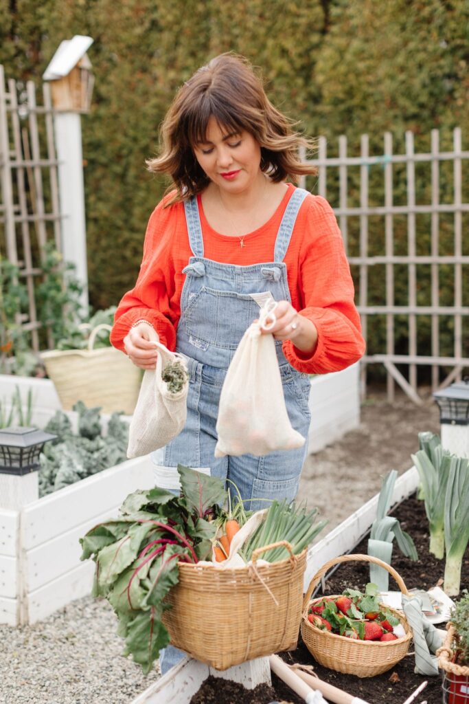 Jillian Harris holding the Better Farm Co Mesh Bags