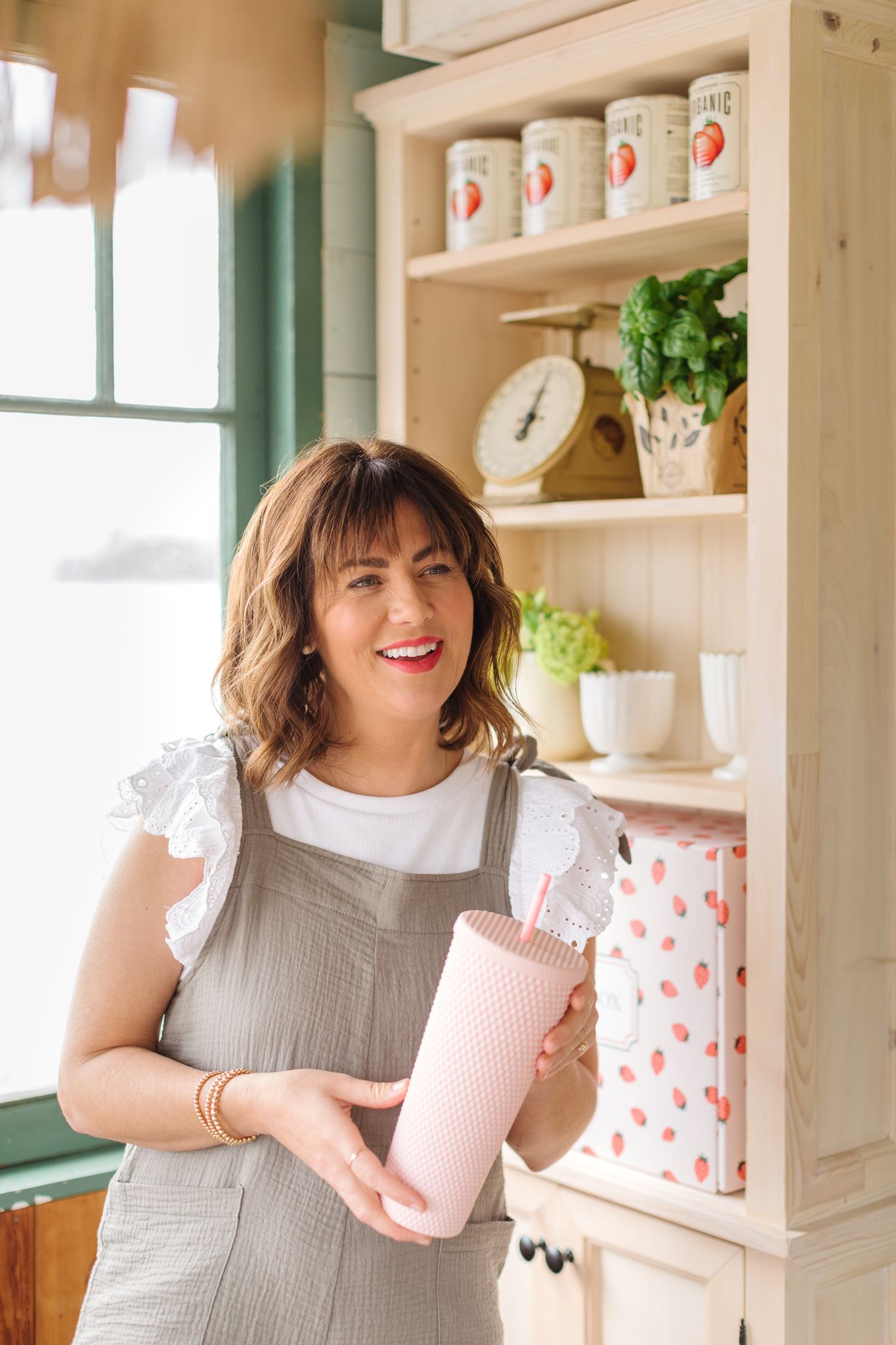 Jillian holding the Jilly Box Studded Tumbler