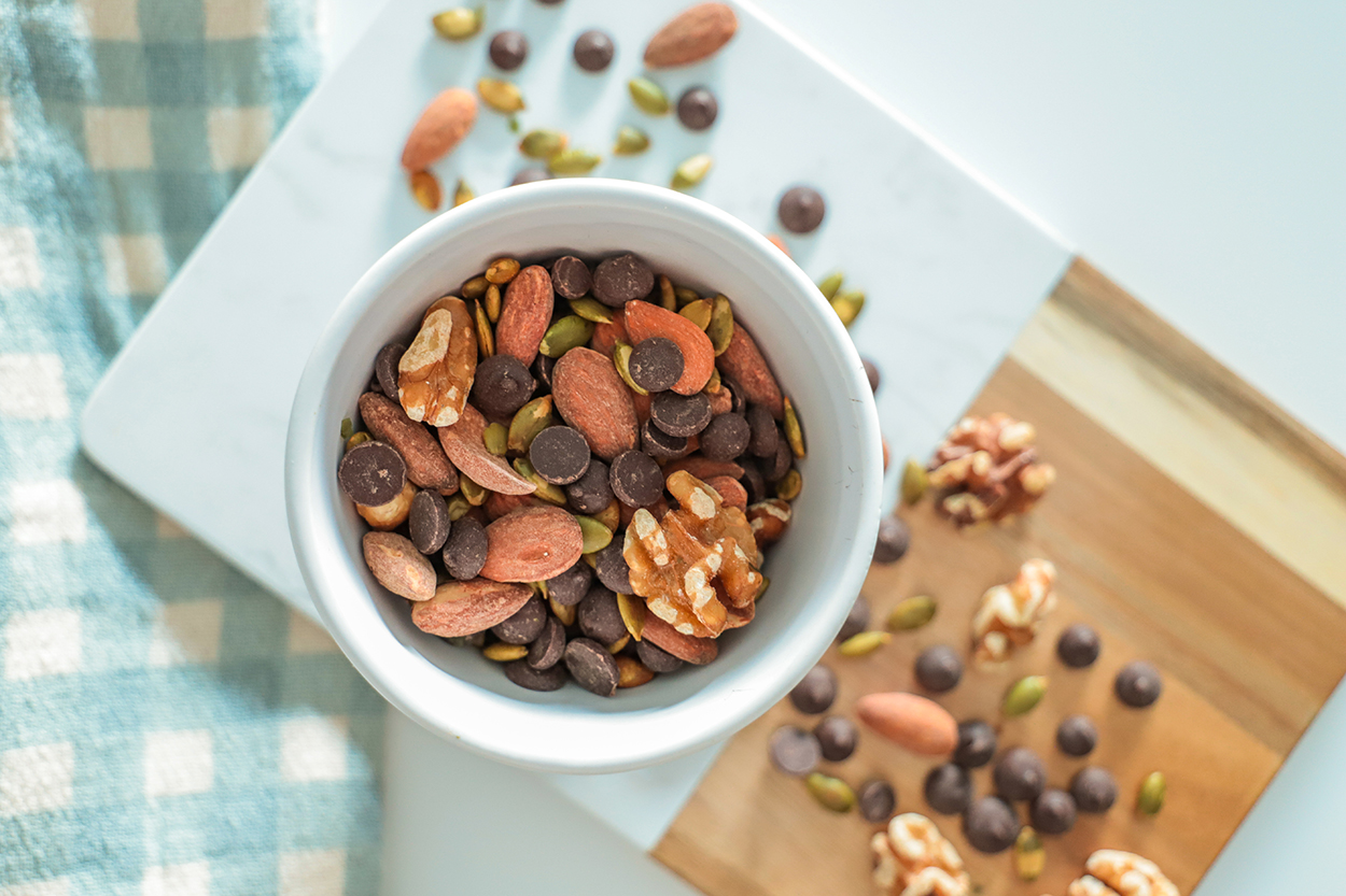 An overview of a nut mix for brain food in a white bowl.