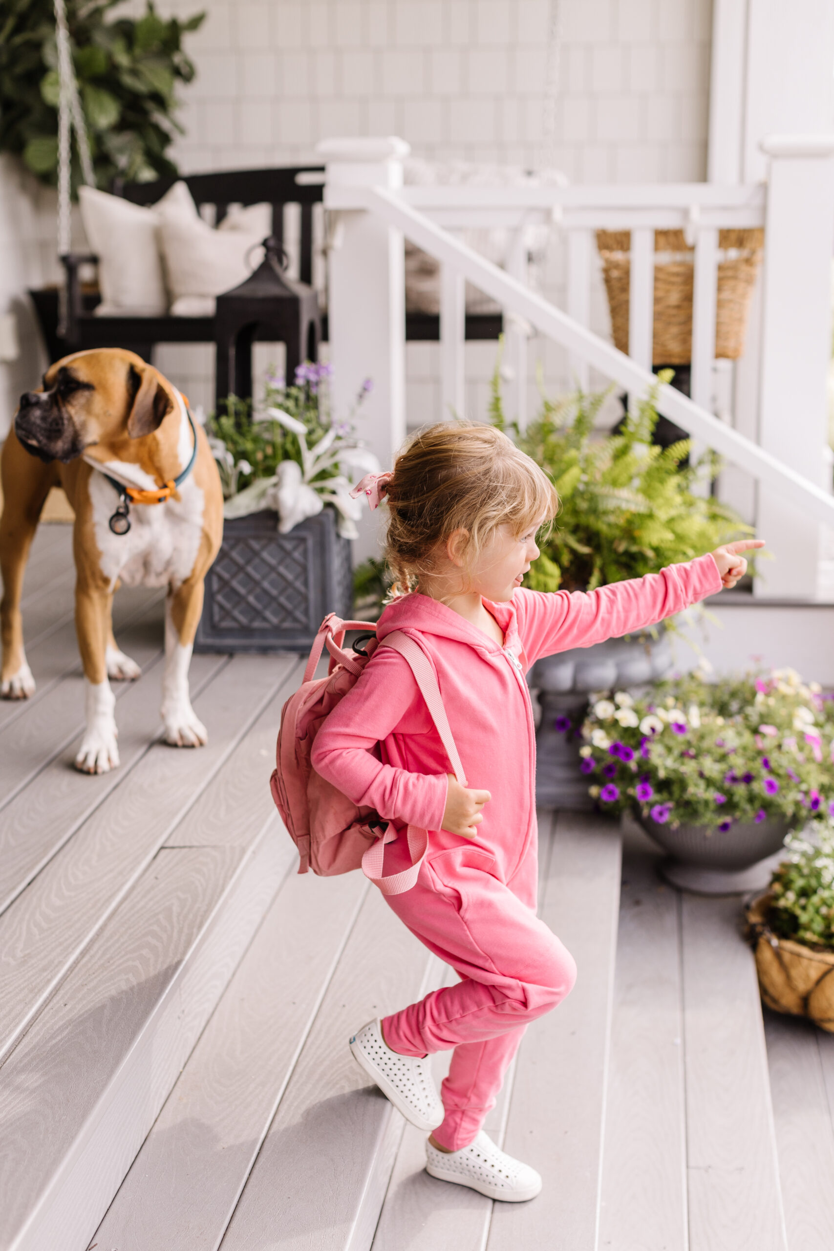 Jillian Harris's daughter Annie in her pink Smash + Tess Romper for the 2022 Kids Gift Guide