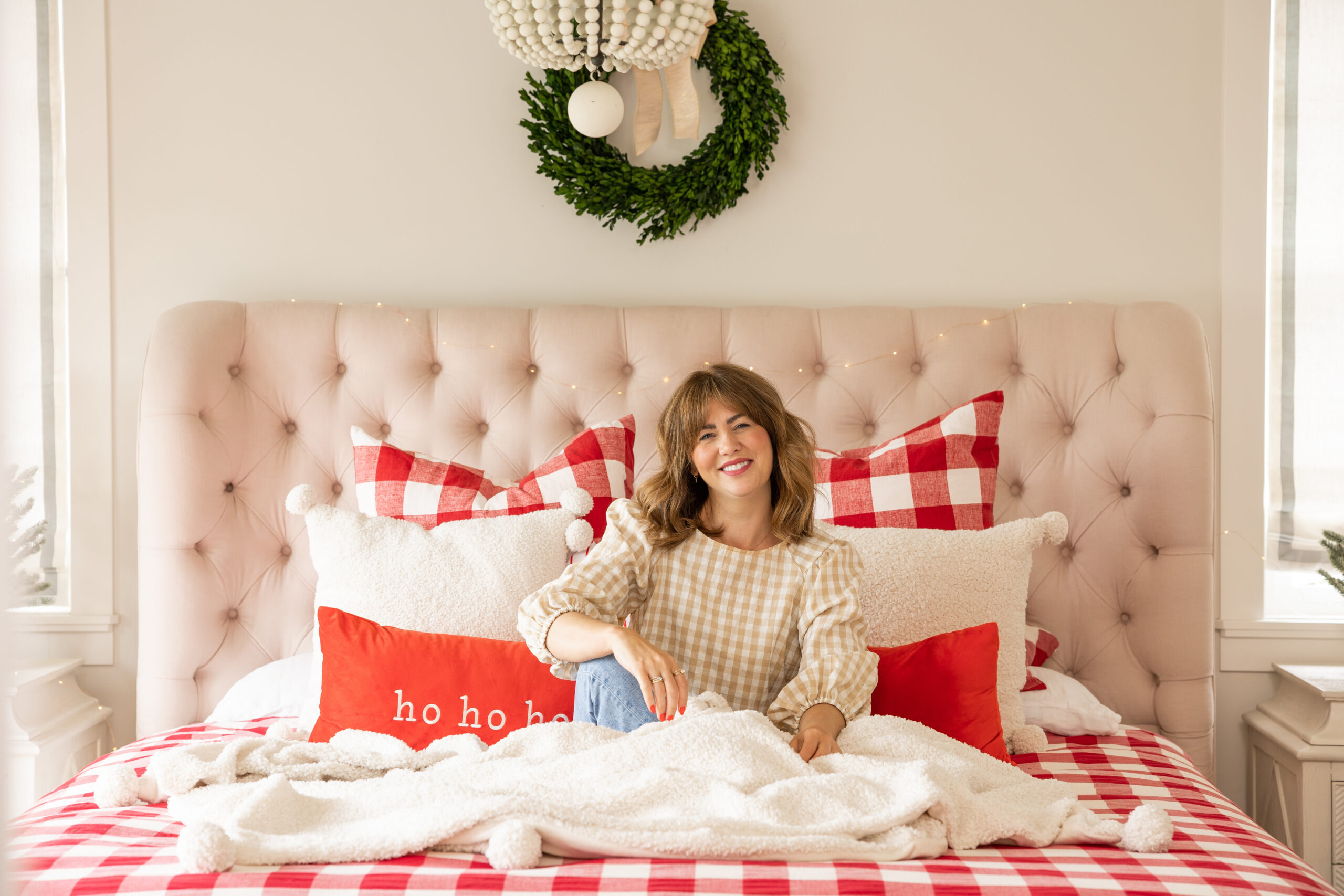 The Jillian Harris x Canvas Christmas Collection featuring the "Ho, Ho, Ho" Lumbar Cushion and the Teddy Pom-Pom Cushion