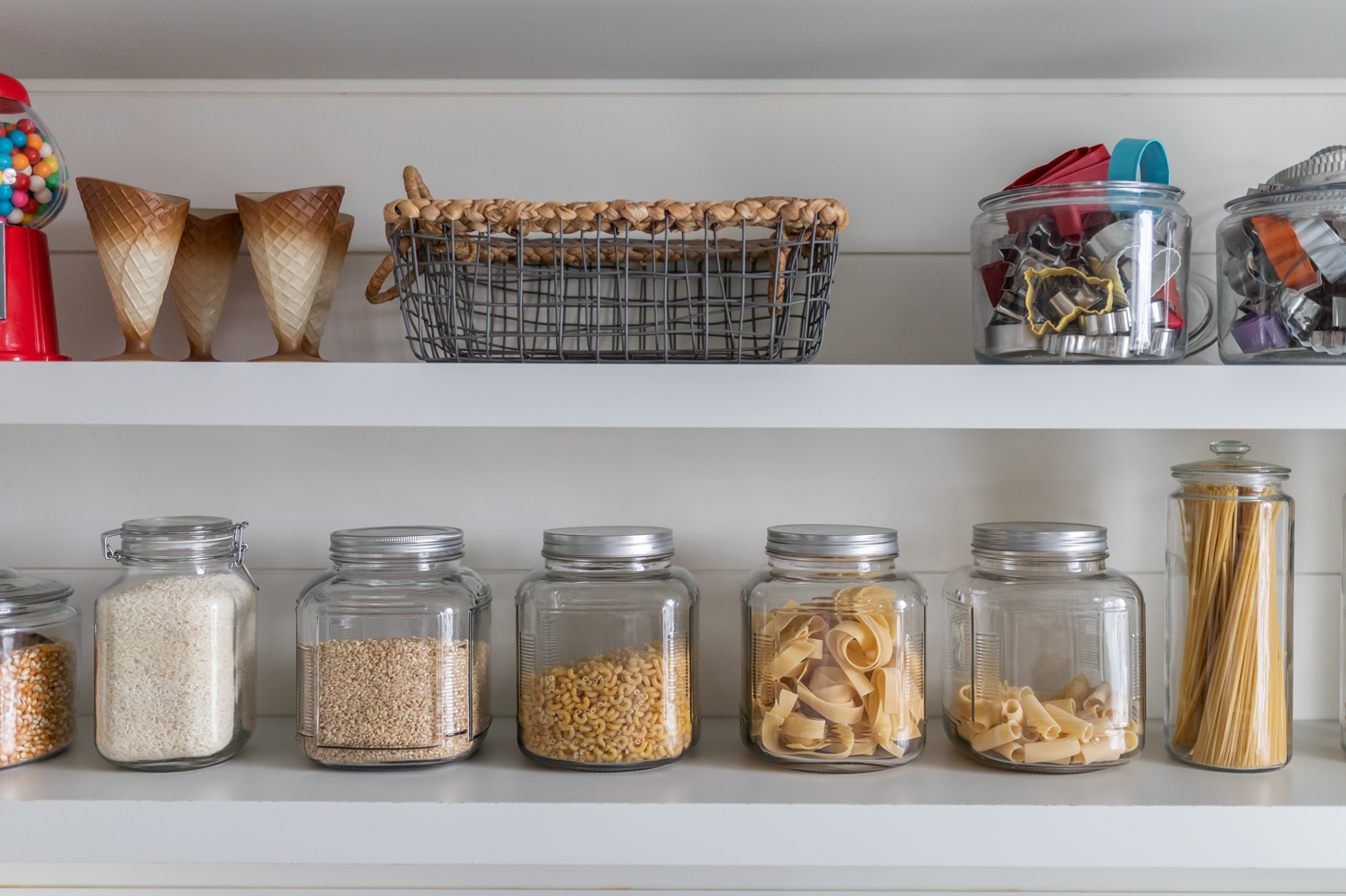 Reorganizing Jillian Harris's pantry with Go Simplified, including glass containers for pasta and baking accessories