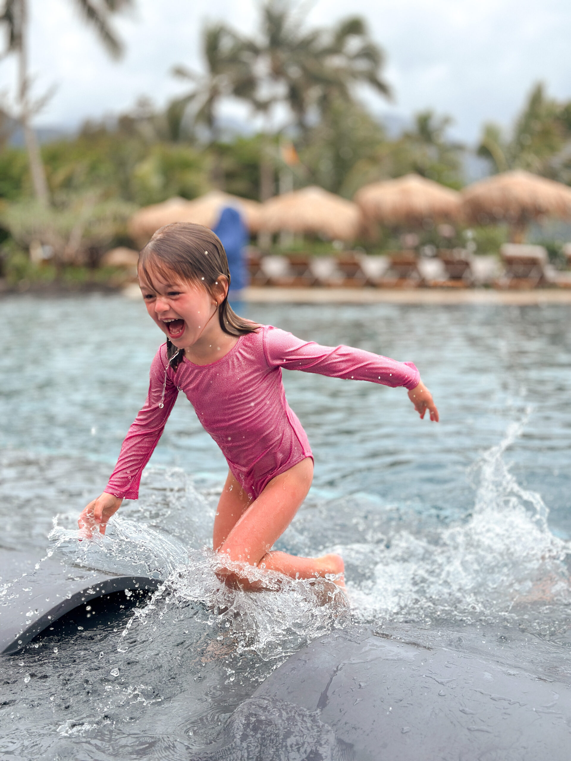 Annie Pasutto playing in the pool at 1 Hotel Hanalei Bay