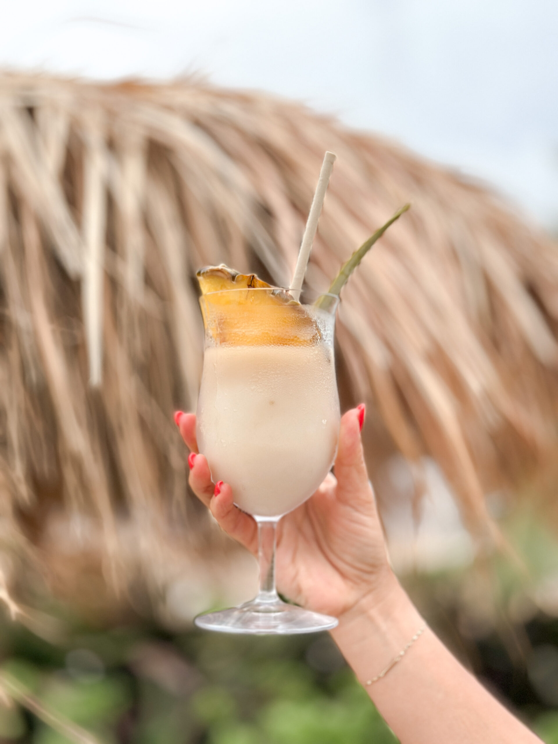 Jillian Harris enjoying a Pina colada at 1 Hotel Hanalei Bay