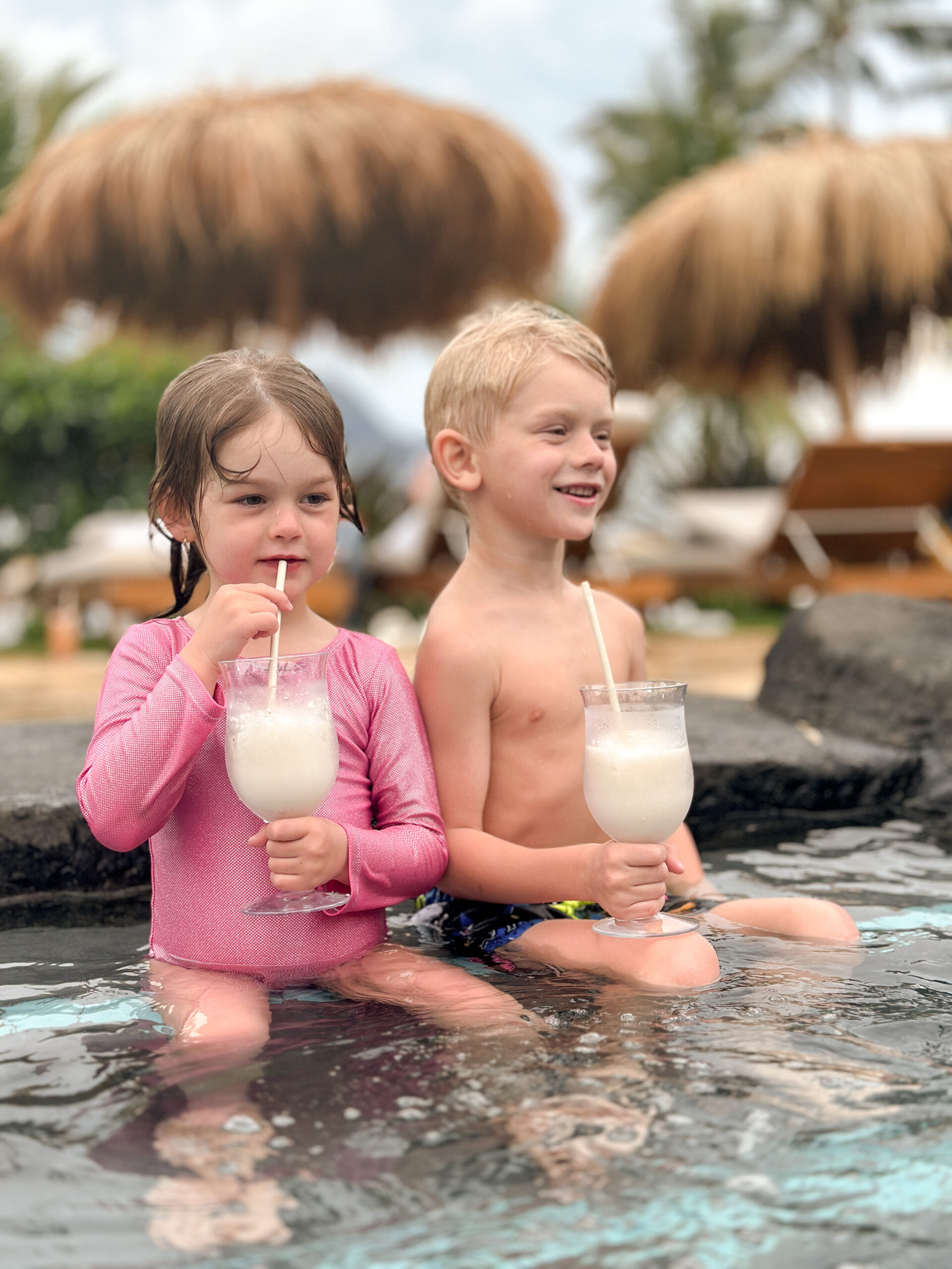 Annie and Leo Pasutto at 1 Hotel Hanalei Bay's pool