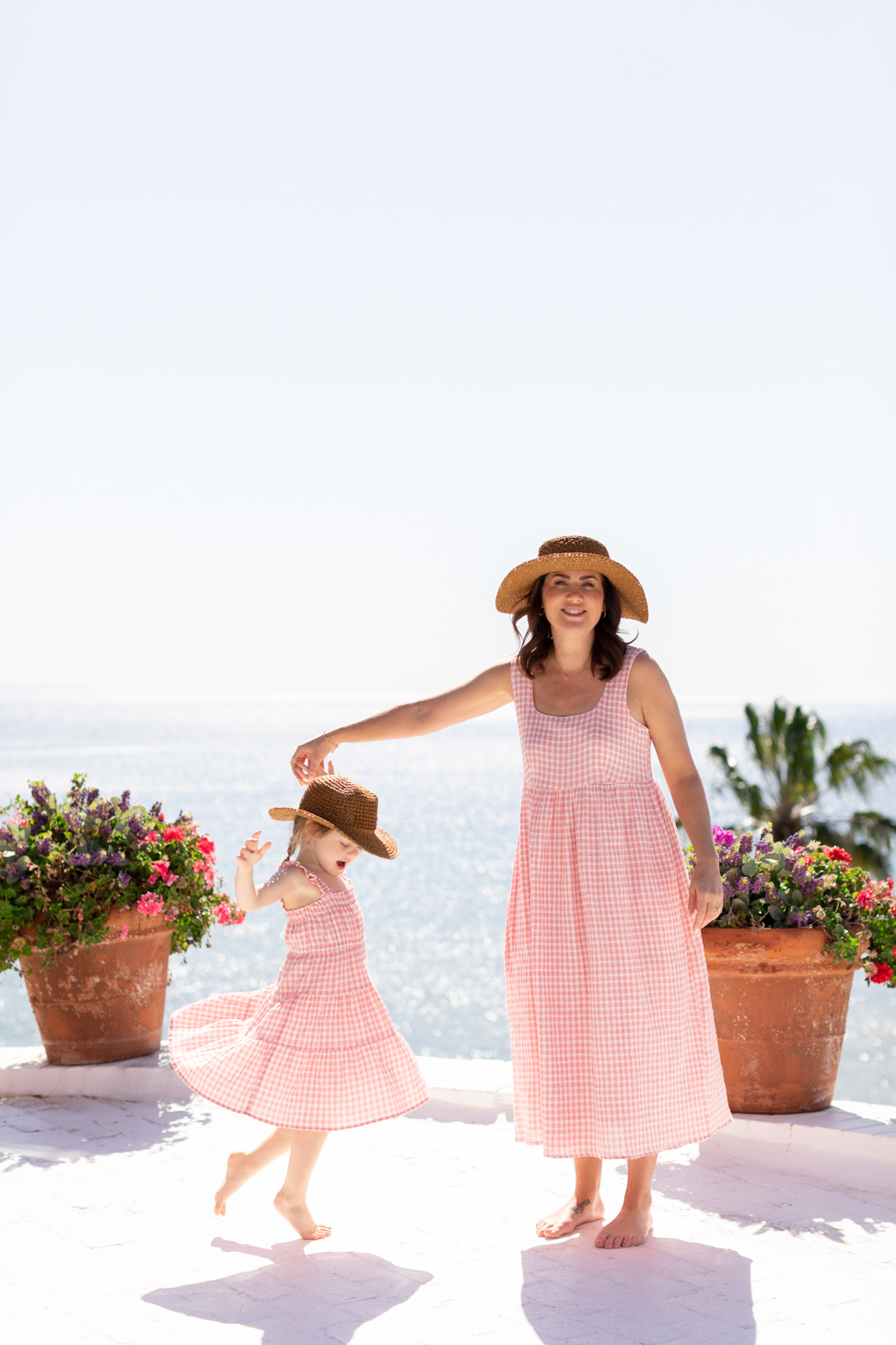 Jillian Harris wearing a red gingham dress for her 2023 Joe Fresh Summer Collection