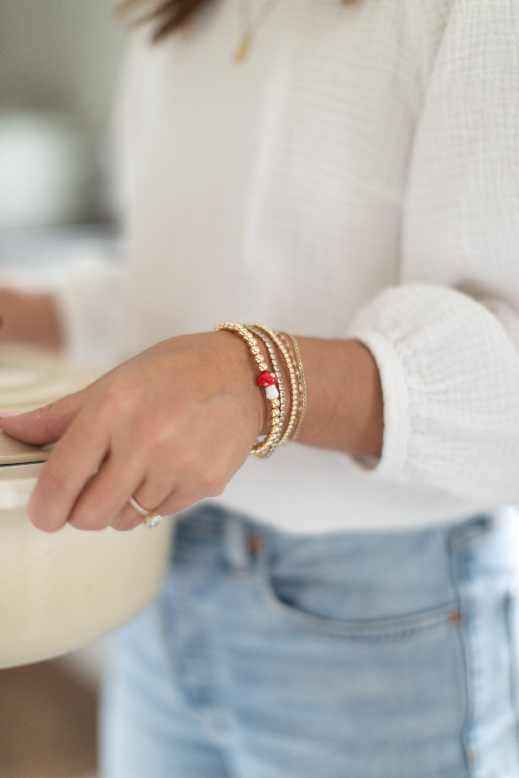 The Fall 2023 Jilly Box Add-On the Rosie Joan 14k Gold-Filled Toadstool bracelets on Jillians wrist 