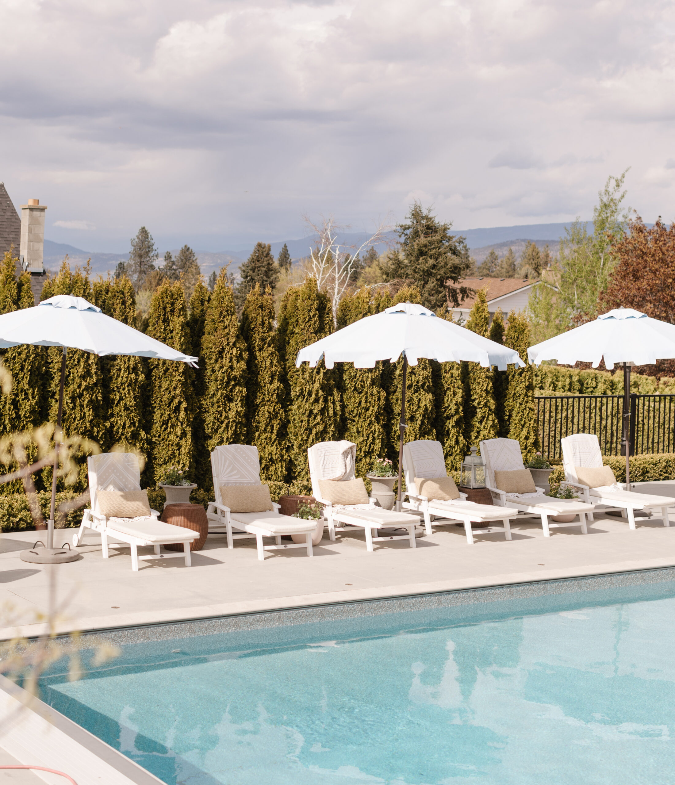 Pool lounge chairs and umbrellas