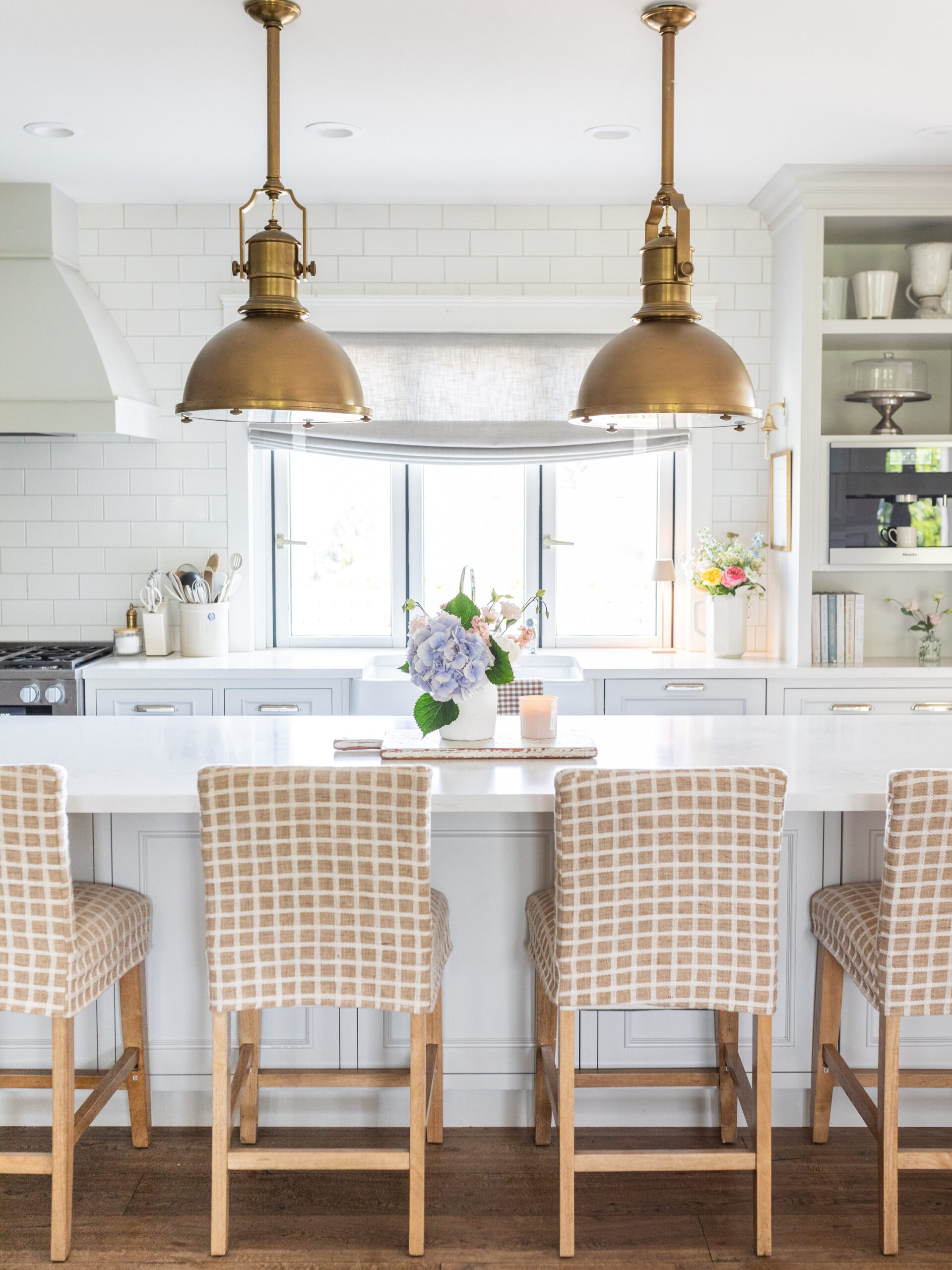 Kitchen island with plaid stools