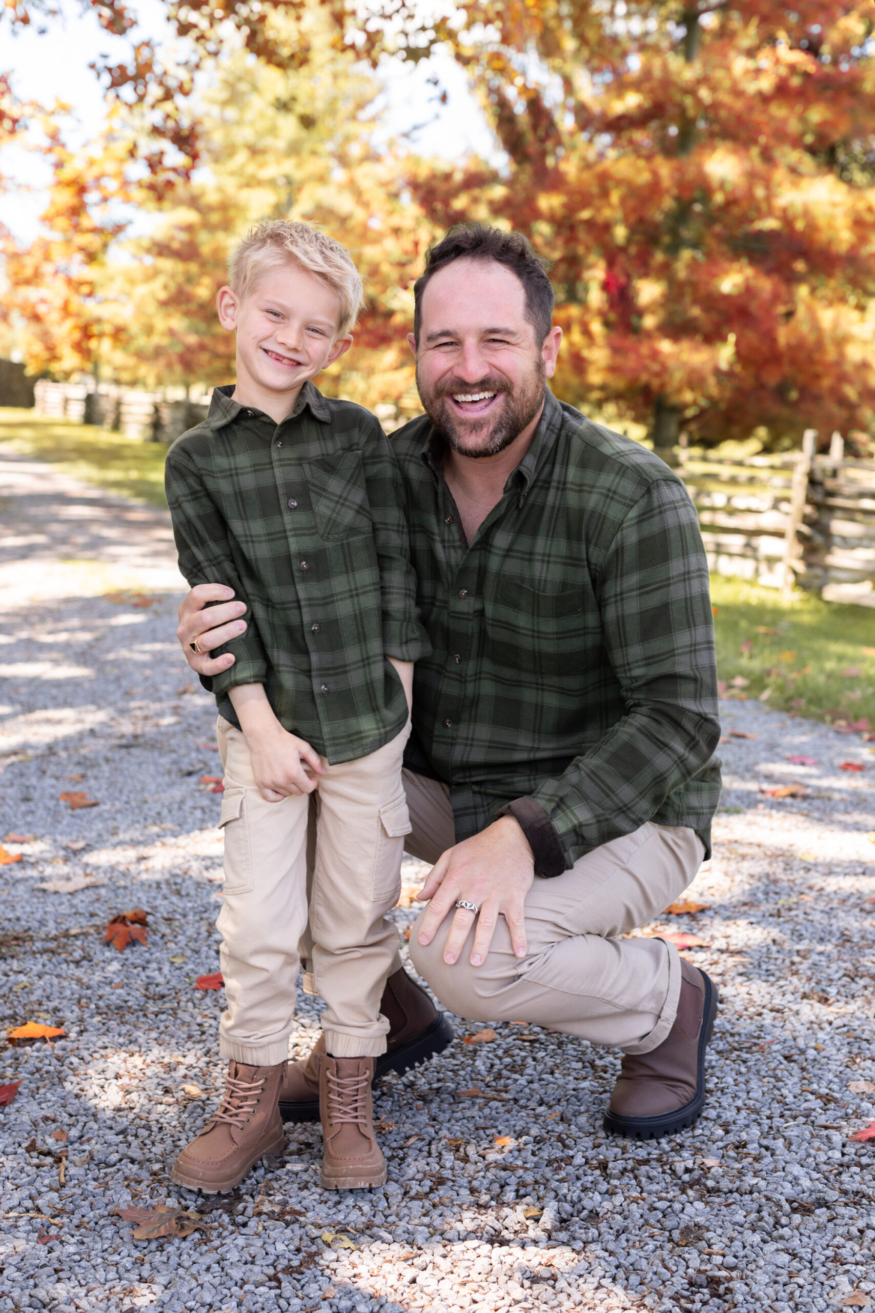 Justin Pasutto and Leo wearing matching green flannel shirts from the 2024 Jillian Harris x Joe Fresh Fall Collection.