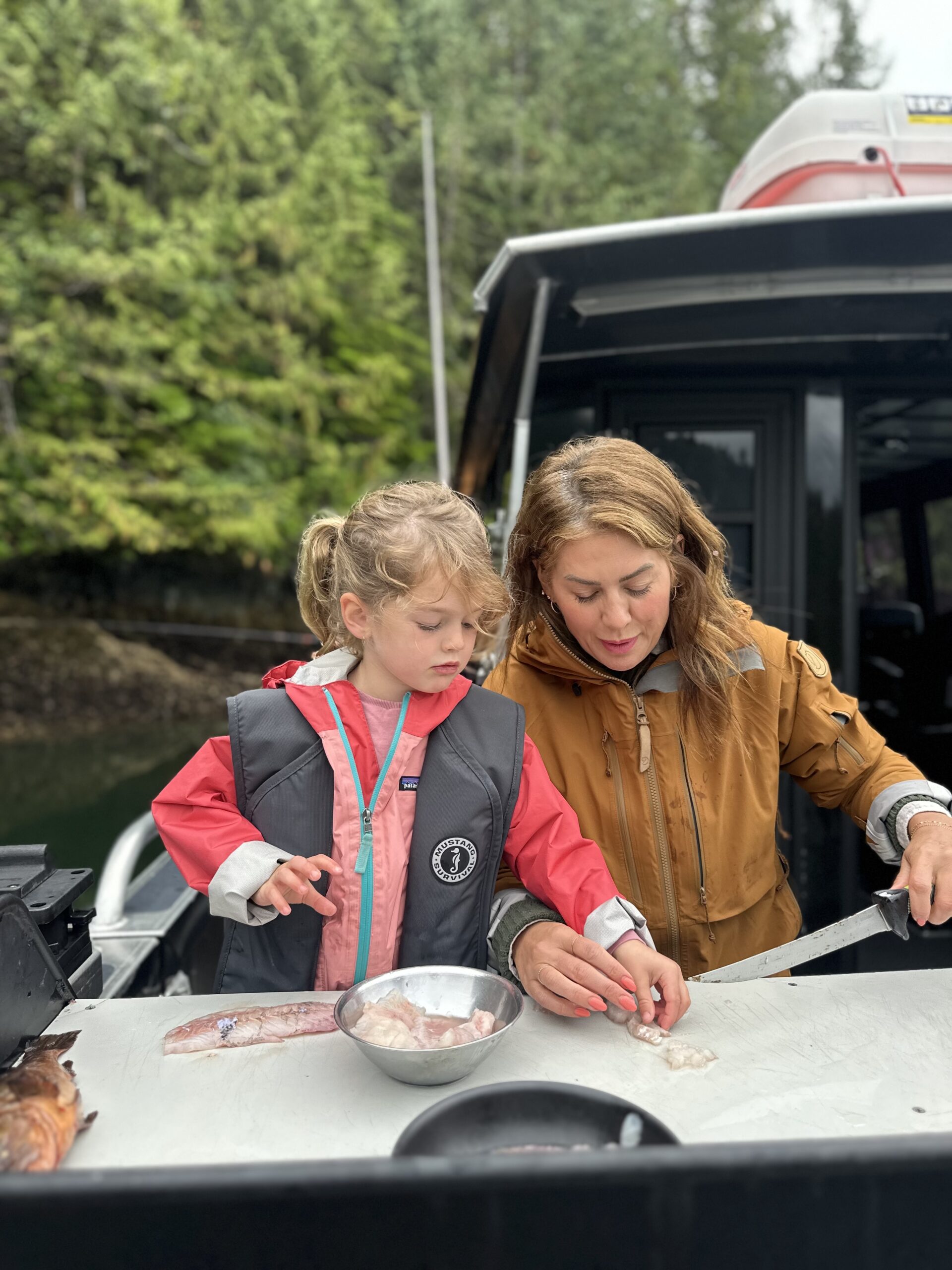 Jillian and Annie on a boat excursion at Nimmo Bay Resort