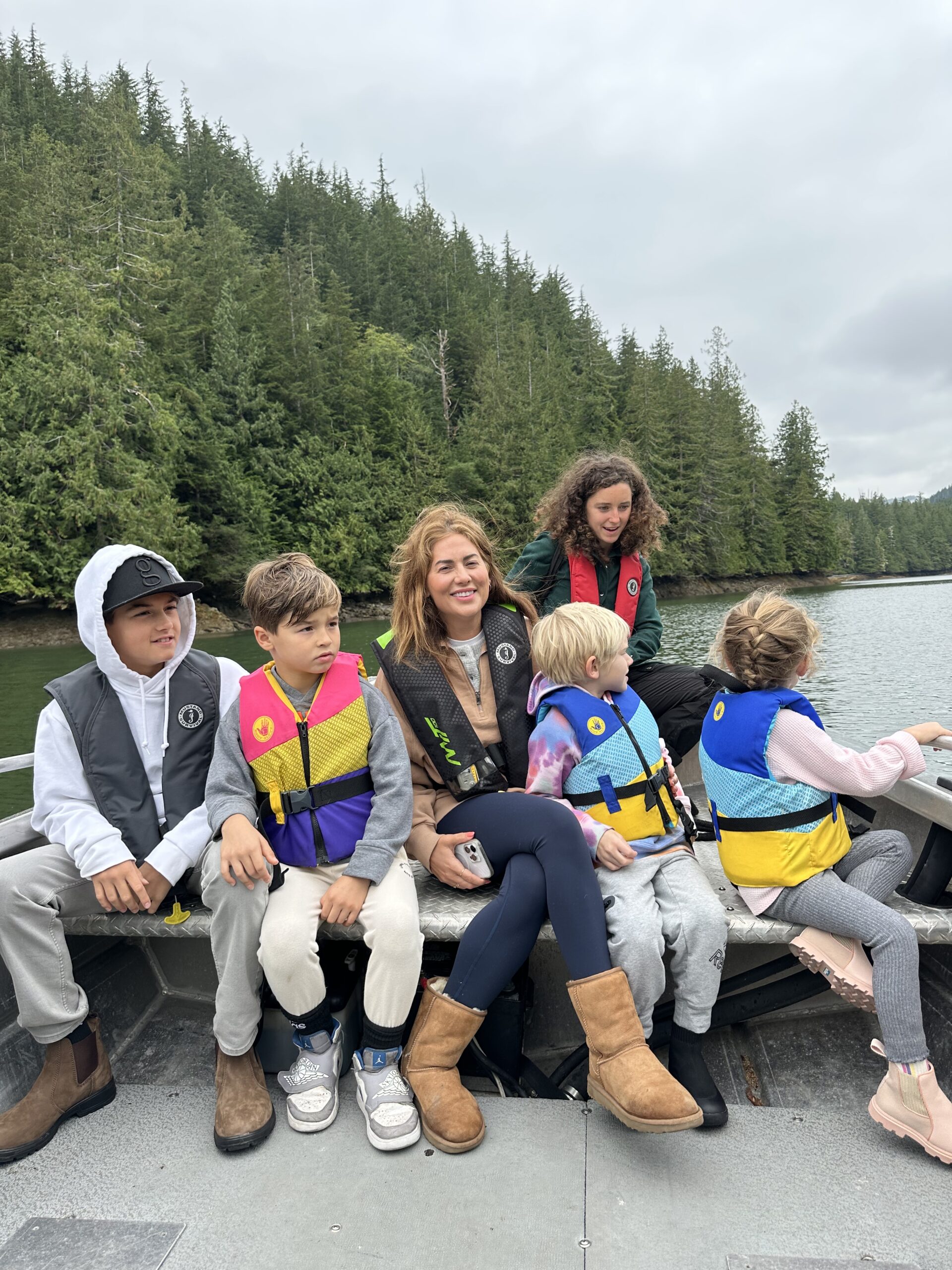 Jillian and family on a boat in Nimmo Bay