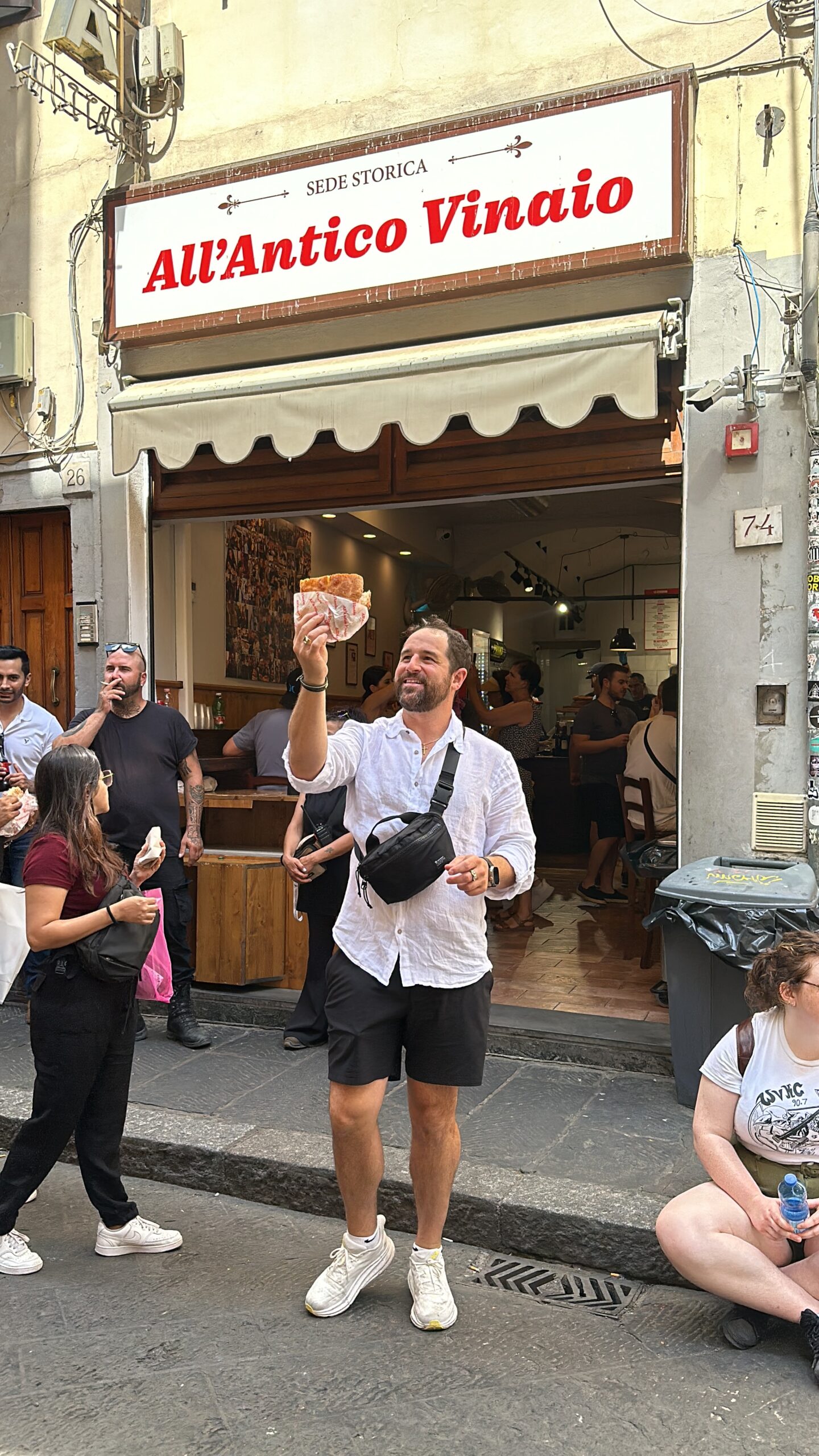 Justin in front of Al Antico Vinaio in Florence, Italy