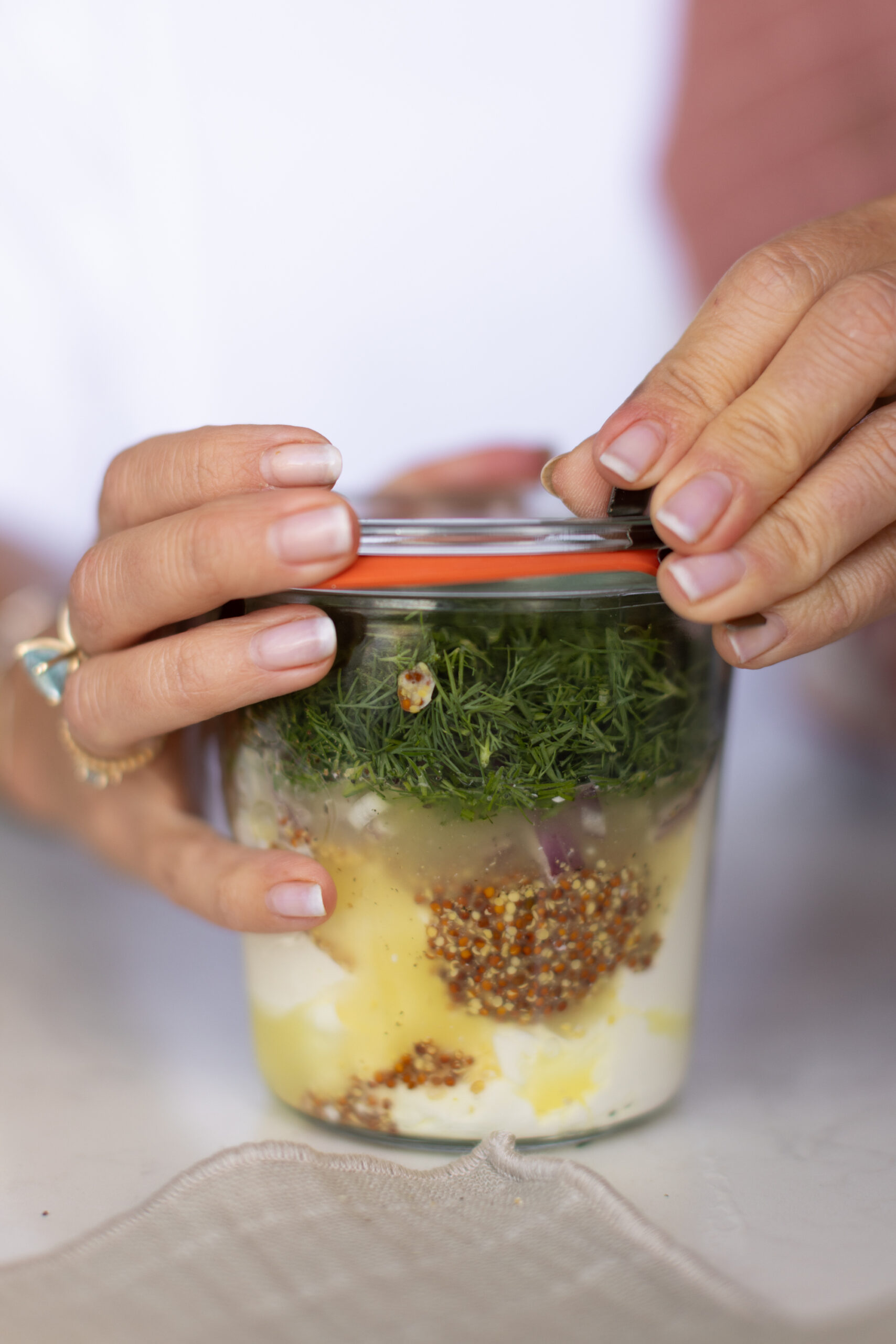 Mixing the potato salad dressing in a jar