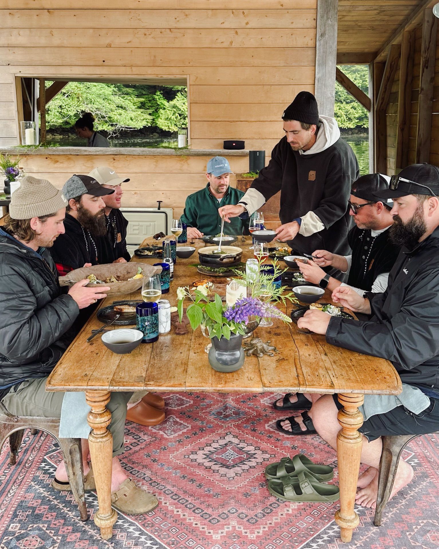 Justin and friends eating breakfast at Nimmo Bay