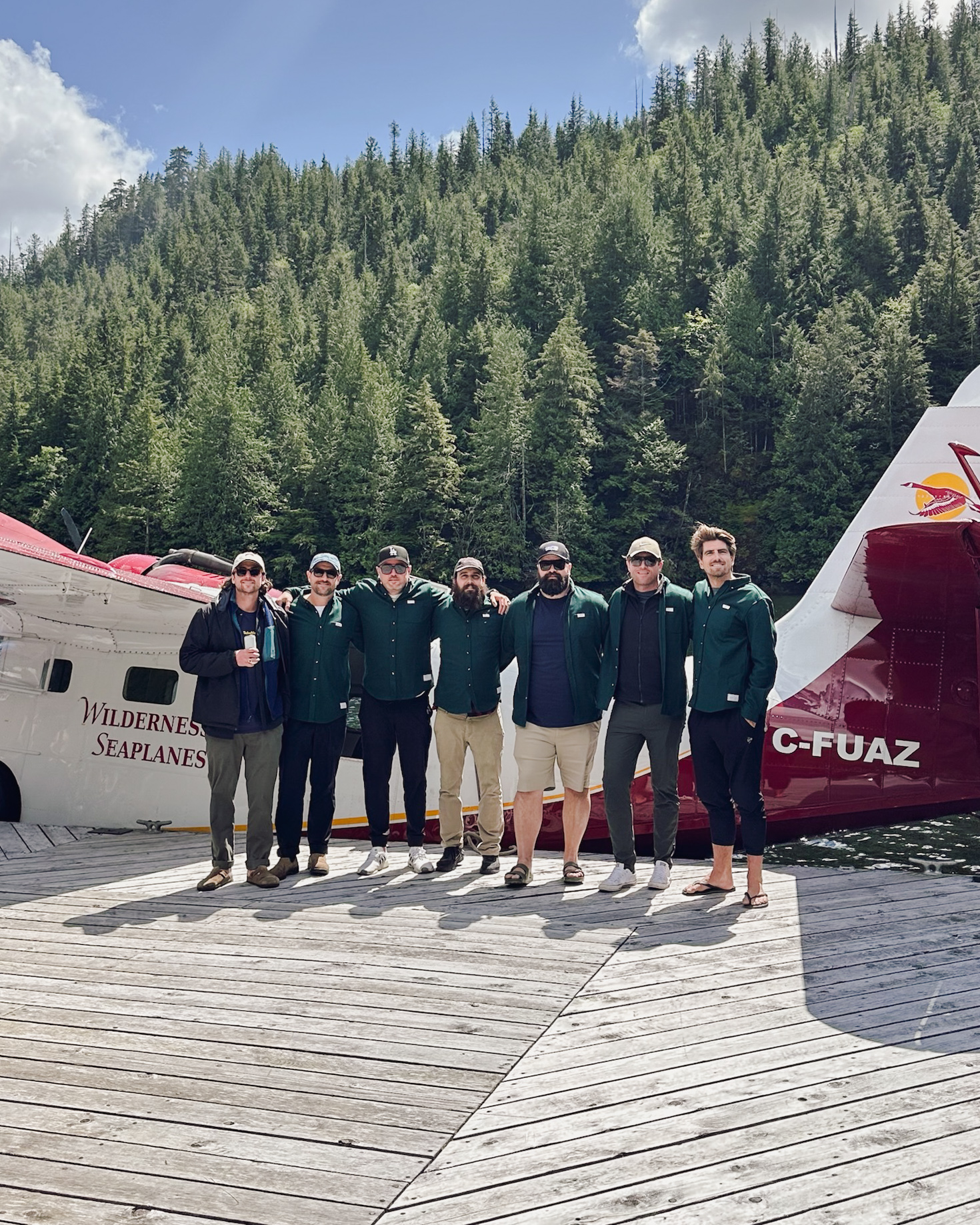 Justin and friends in front of float plane at Nimmo Bay
