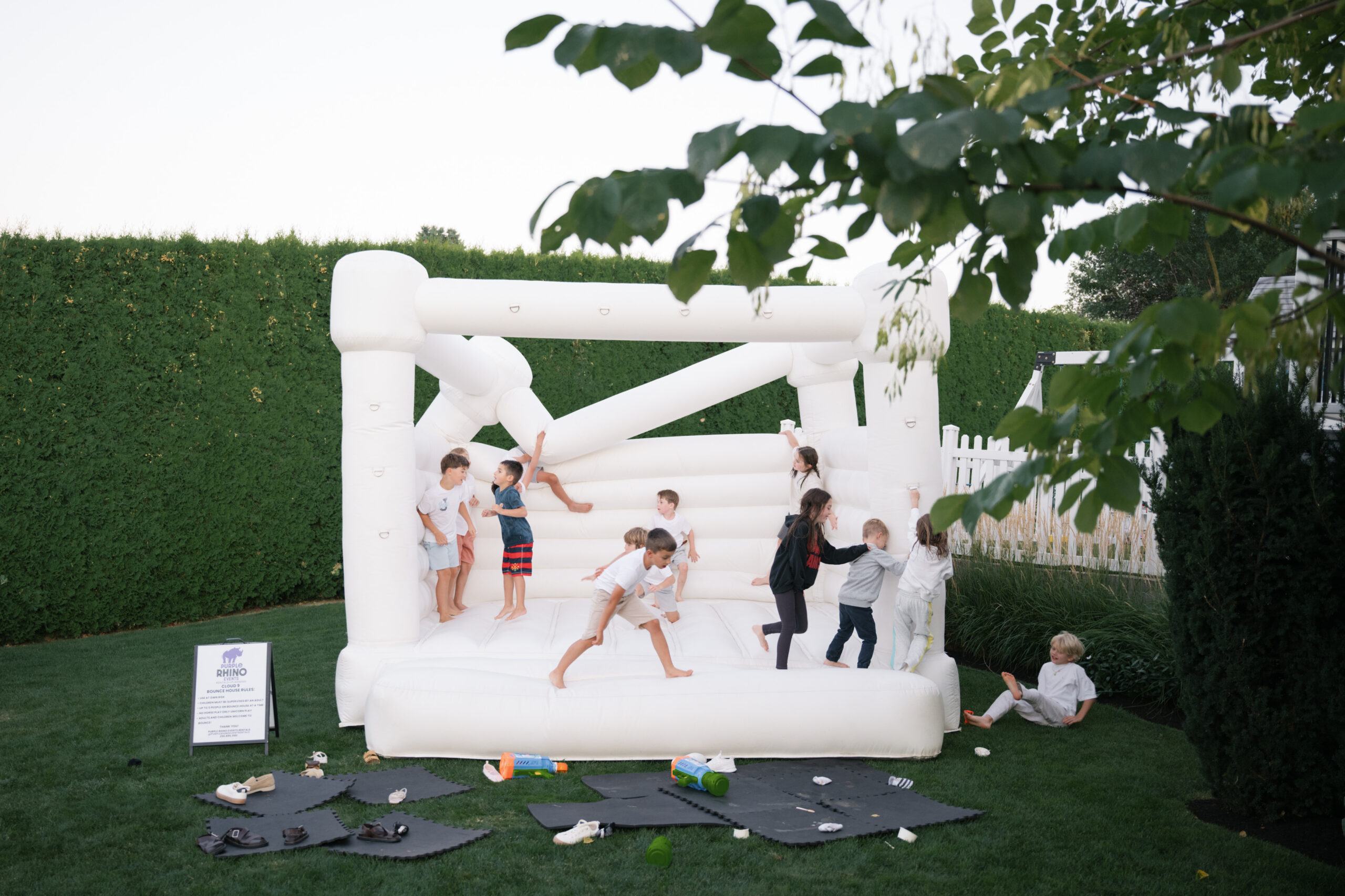 The kids playing in the bouncy castle