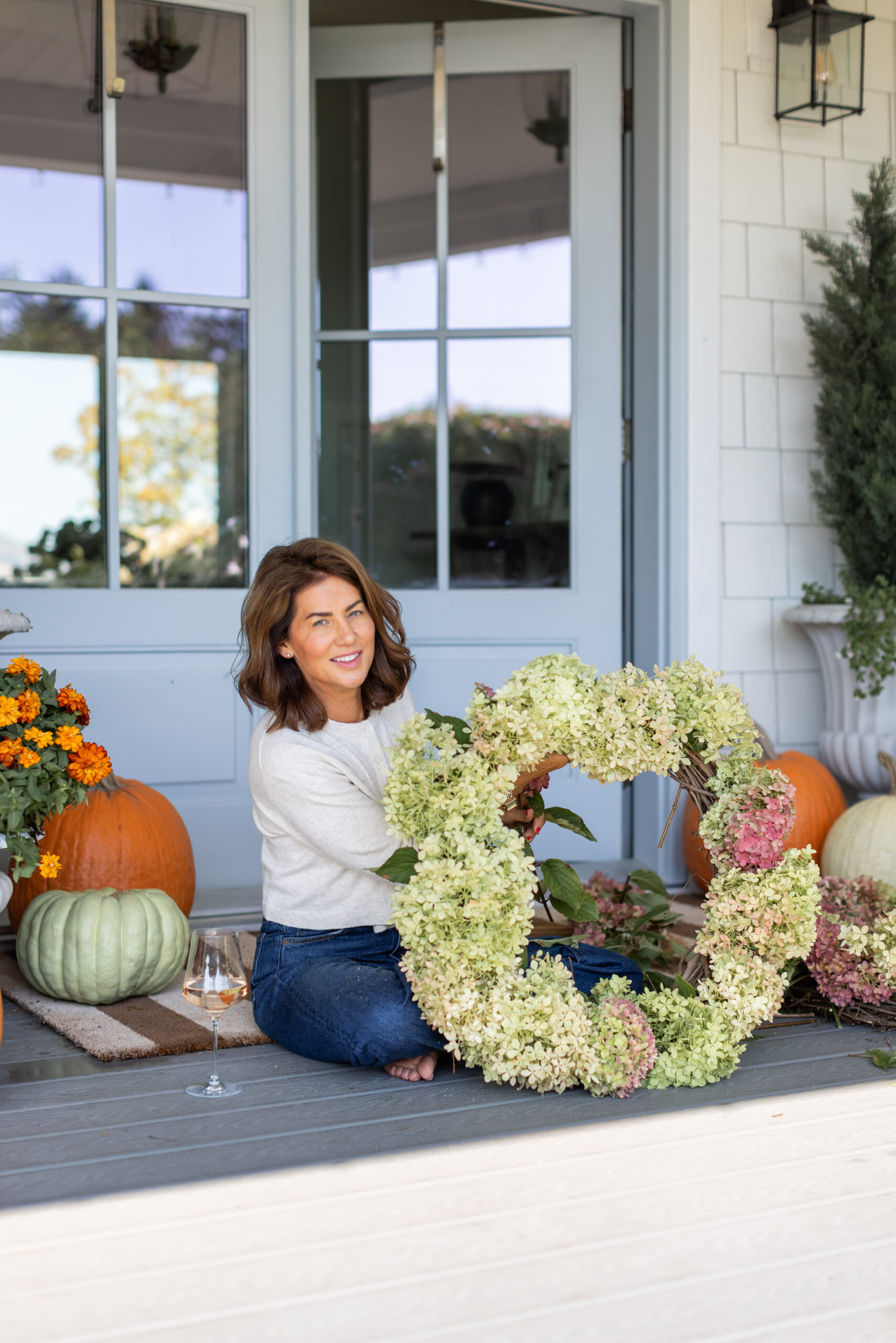 Jillian assembling the hydrangea wreath diy