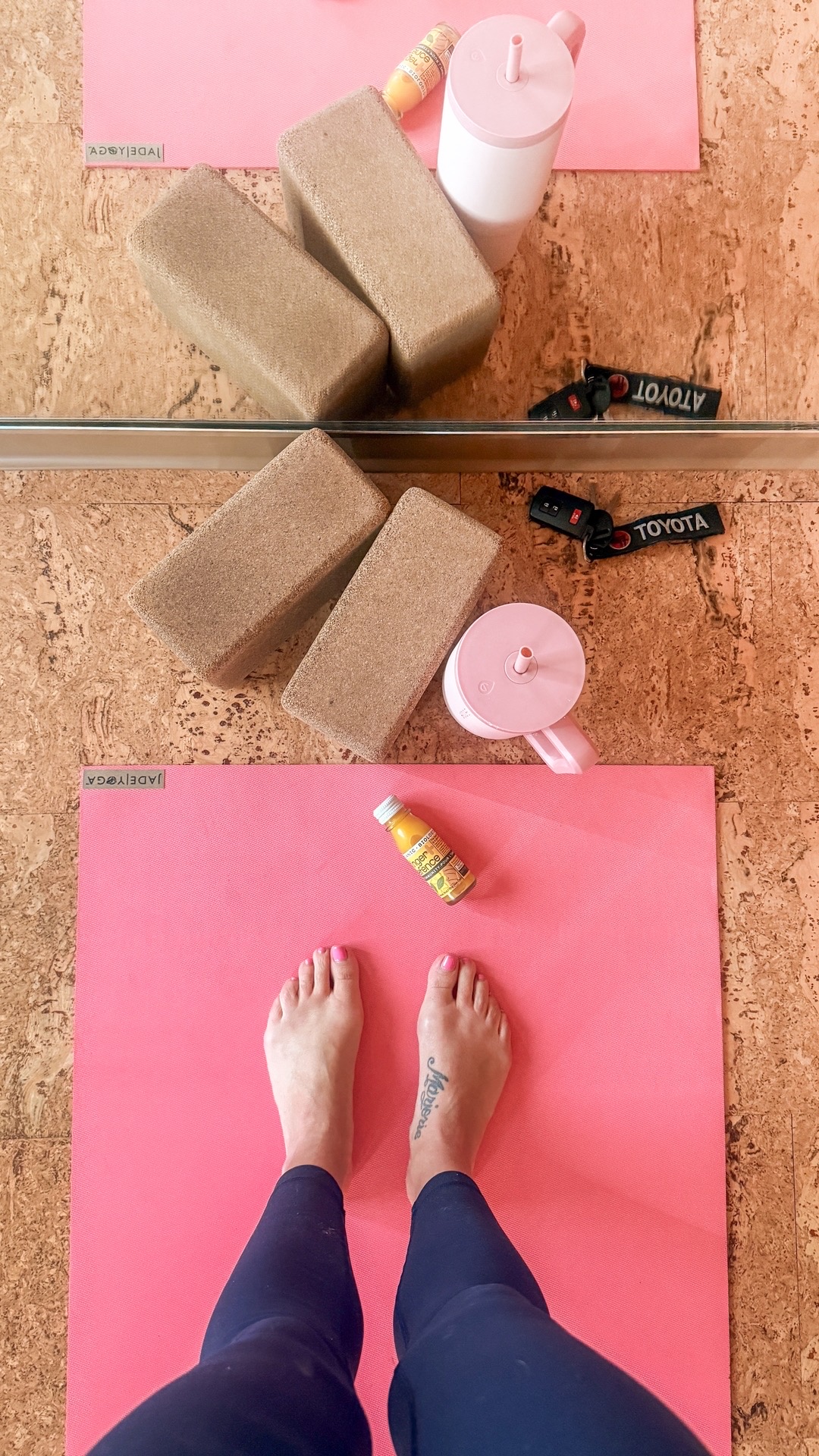 Yoga mat, water bottle, yoga blocks and greenhouse ginger shot