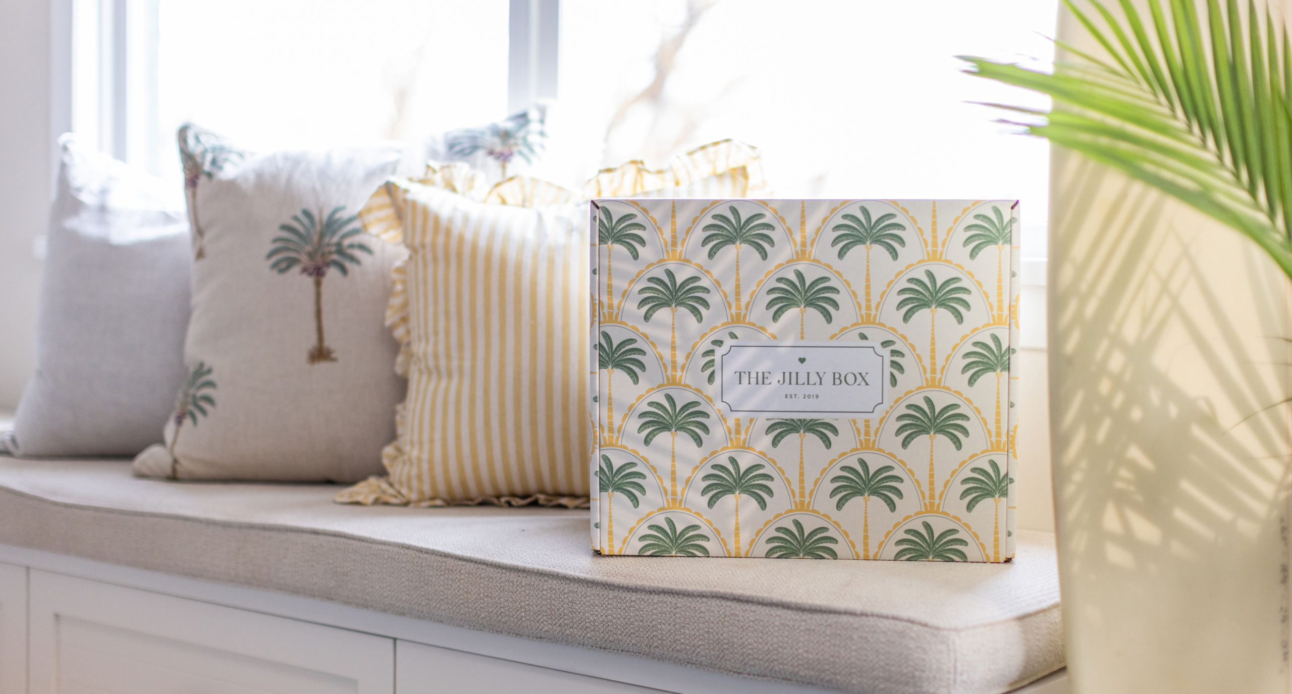 The Summer 2026 Jilly Box on a window bench.