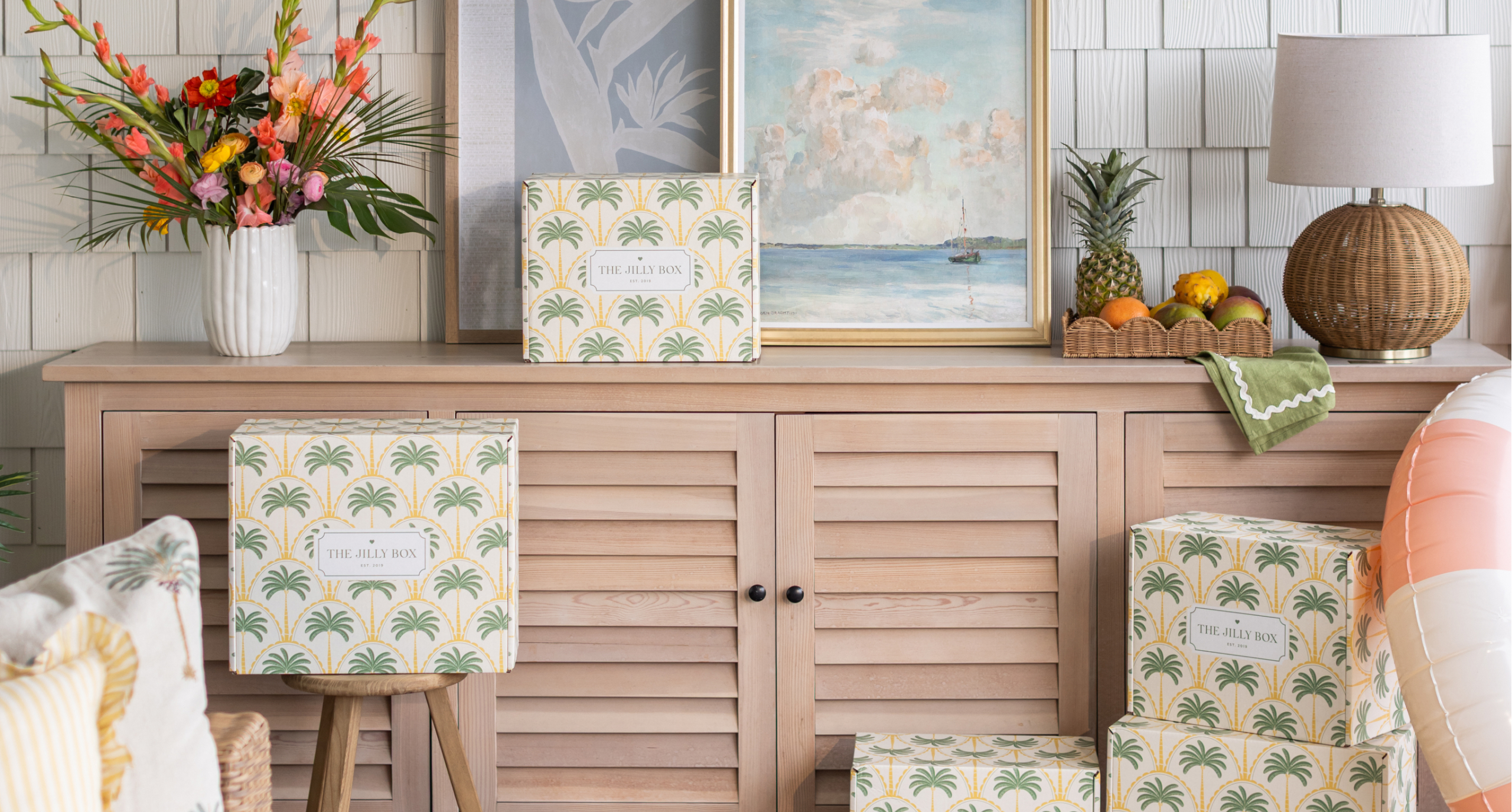Summer 2026 Jilly Boxes styled on an outdoor setting.