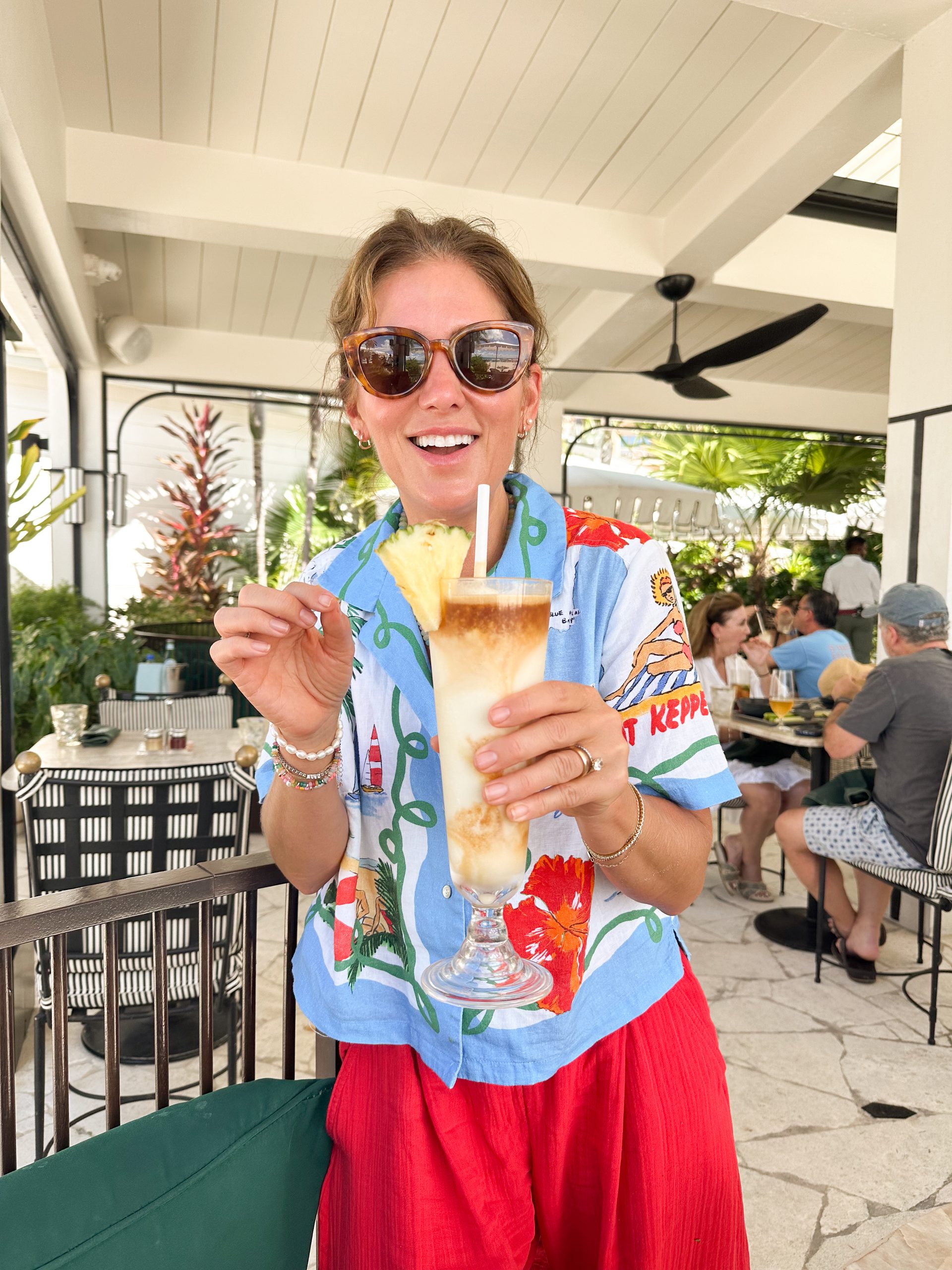 Jillian having a drink at the Ritz-Carlton in Cayman